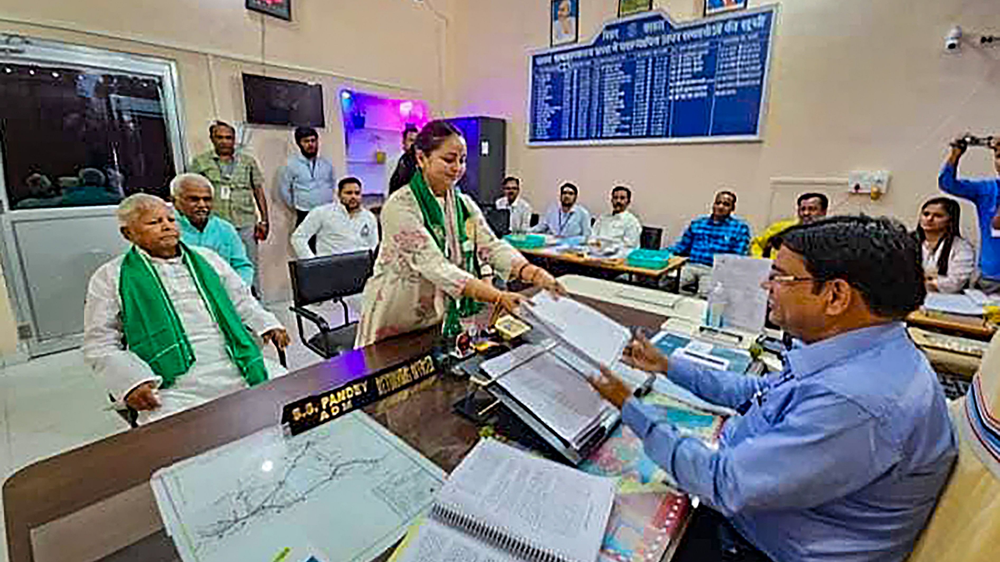 <div class="paragraphs"><p> RJD candidate from Saran constituency Rohini Acharya files her nomination for Lok Sabha elections in the presence of her father and party chief Lalu Prasad Yadav, in Saran district.</p></div>