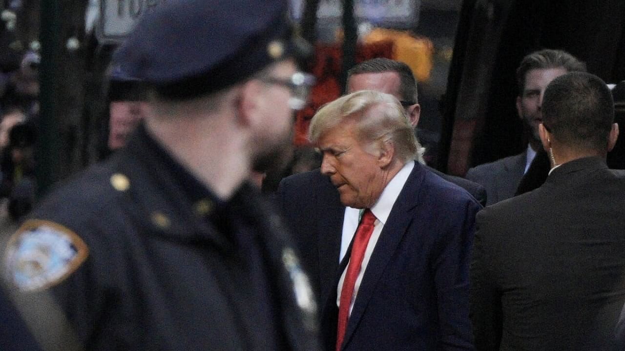 <div class="paragraphs"><p>Former US President Donald Trump arrives at Trump Tower, after his indictment by a Manhattan grand jury following a probe into hush money paid to porn star Stormy Daniels, in New York City.</p></div>
