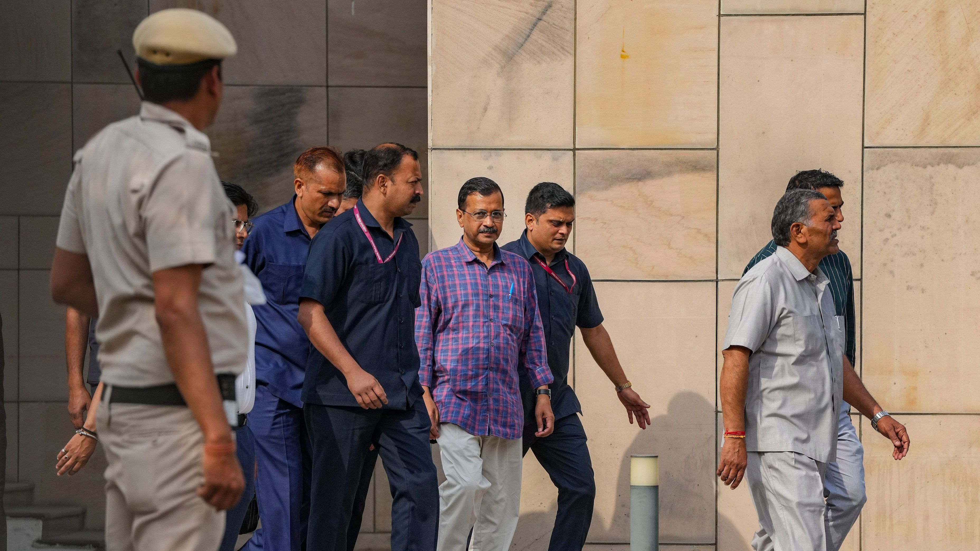 <div class="paragraphs"><p> Delhi Chief Minister and AAP convenor Arvind Kejriwal leaves the Rouse Avenue Court where he was produced in the excise policy-linked money laundering case, in New Delhi. A Delhi court Monday sent Kejriwal to judicial custody till April 15.</p></div>
