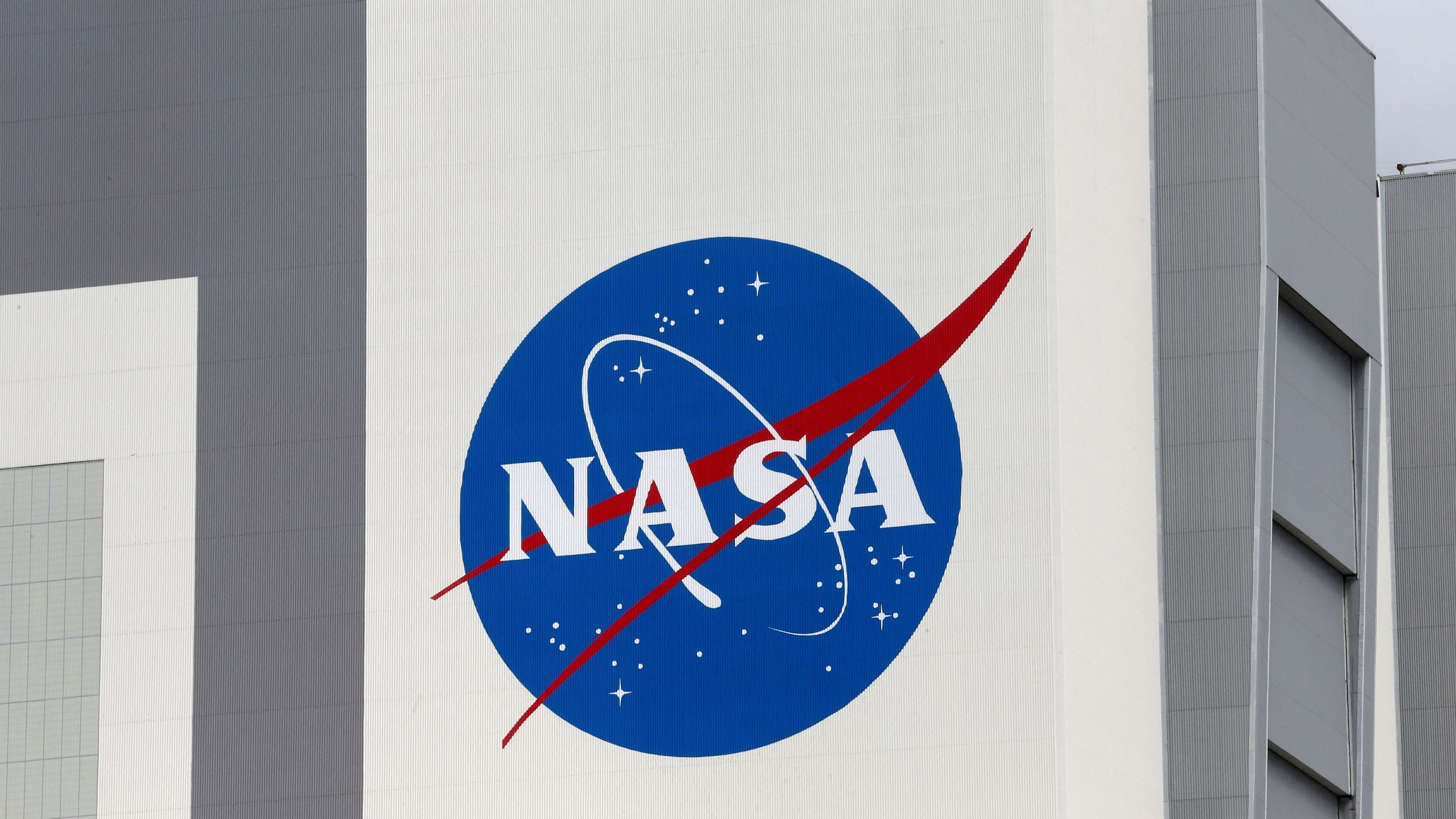 <div class="paragraphs"><p>FILE PHOTO: The NASA logo is seen at Kennedy Space Center ahead of the NASA/SpaceX launch of a commercial crew mission to the International Space Station in Cape Canaveral, Florida, US, April 16, 2021. </p></div>