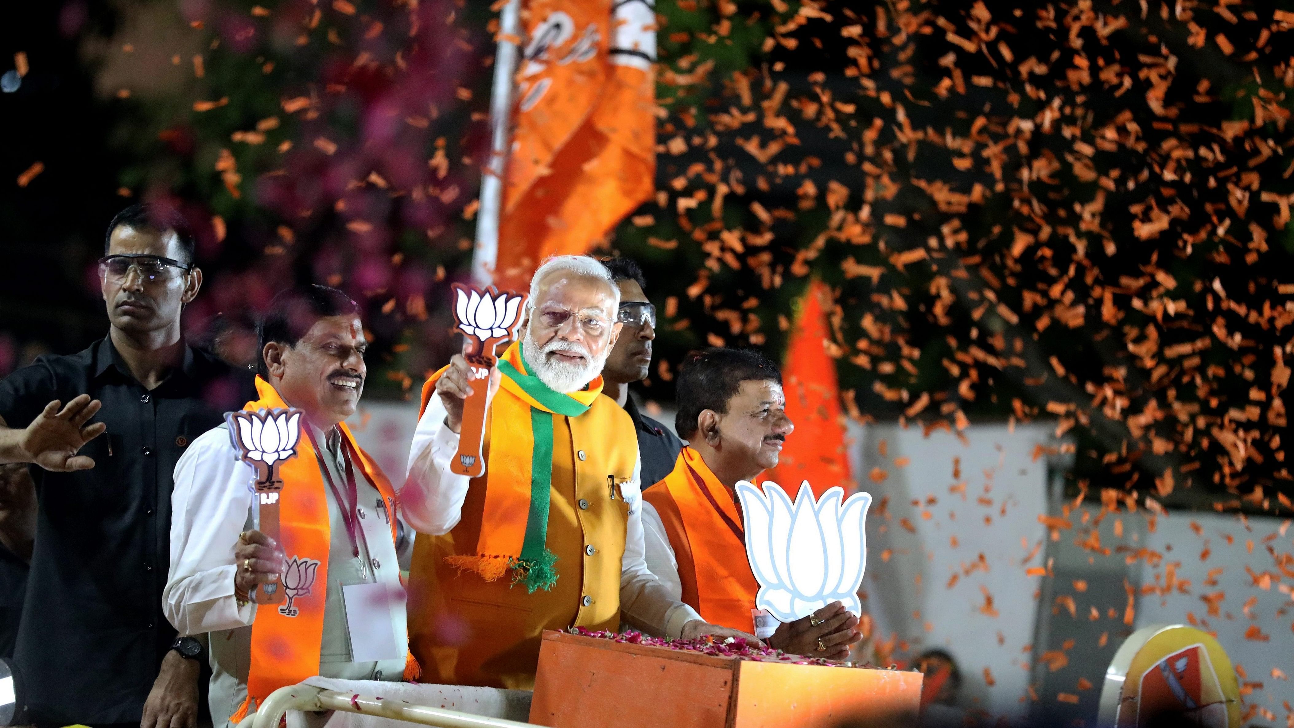 <div class="paragraphs"><p>File Photo: Prime Minister Narendra Modi with Madhya Pradesh Chief Minister Mohan Yadav and others during a roadshow in Bhopal, Wednesday, April 24, 2024.</p></div>