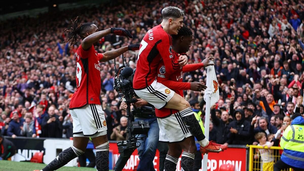 <div class="paragraphs"><p>Kobbie Mainoo celebrates after scoring Manchester United's second goal against Liverpool at Old Trafford on Sunday, April 7.</p></div>