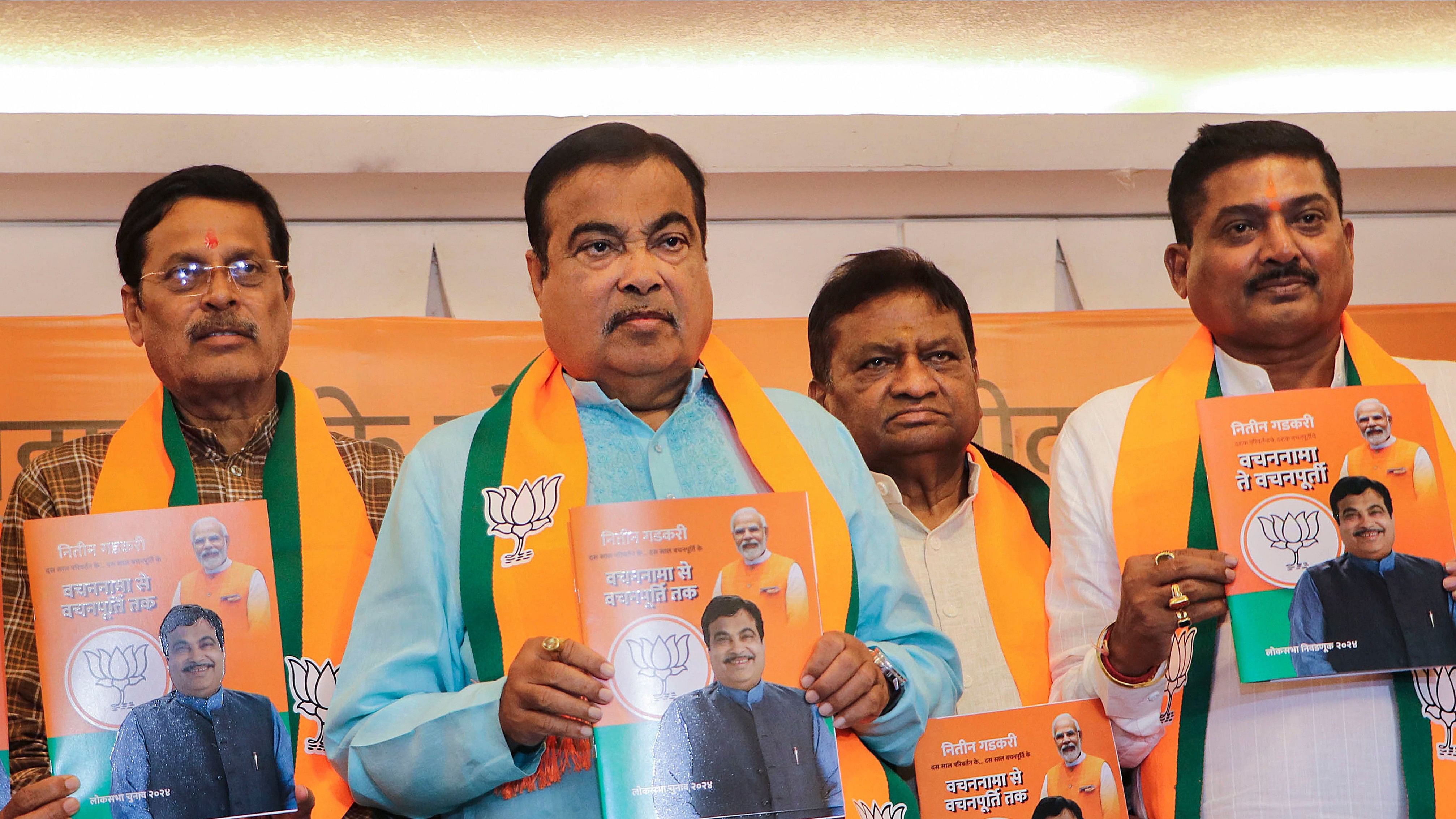<div class="paragraphs"><p>Union Minister and BJP candidate Nitin Gadkari with other leaders releases 'Nagpur Sankalp Patra' for Lok Sabha polls, in Nagpur, Tuesday, April 16, 2024.</p></div>