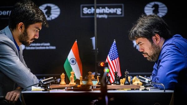 <div class="paragraphs"><p>Grandmaster Gukesh D plays against Grandmaster Hikaru Nakamura at the FIDE Candidates 2024 chess tournament, in Toronto, Canada</p></div>