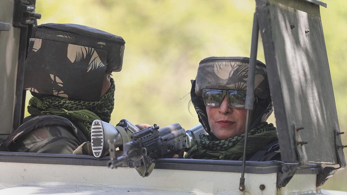 <div class="paragraphs"><p>A female commando of the Special Operations Group (SOG) of J&amp;K Police during a security operation, in Jammu, Saturday, April 6, 2024. </p></div>