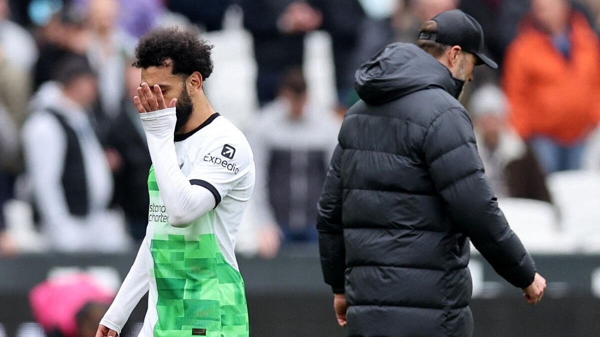 <div class="paragraphs"><p>Liverpool's Mohamed Salah and manager Jurgen Klopp looks dejected after the match </p></div>