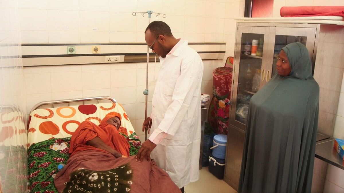 <div class="paragraphs"><p>An old woman hospitalized for dehydration during the recent record heat wave, receives IV drip while she is being consulted at an hospital in Niamey, Niger </p></div>