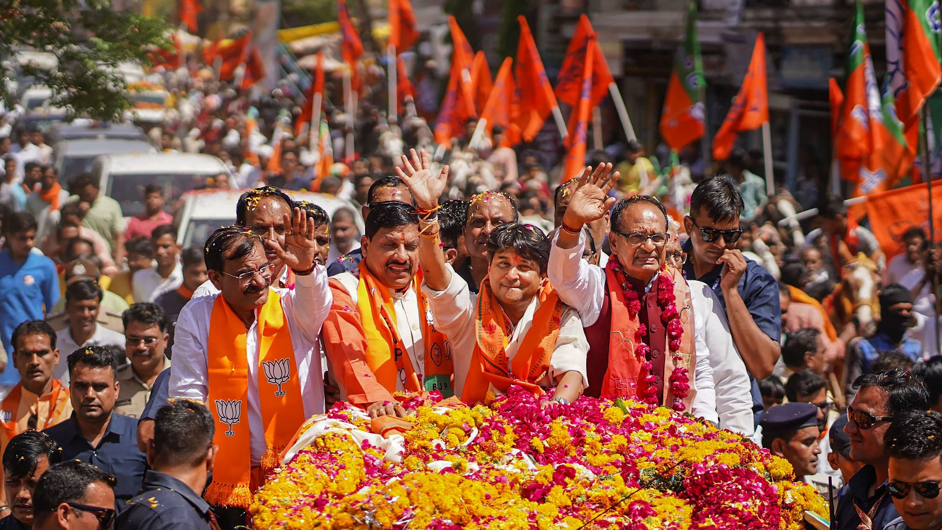 <div class="paragraphs"><p>Union Minister and BJP candidate Jyotiraditya Scindia with Madhya Pradesh Chief Minister Mohan Yadav, former CM Shivraj Singh Chouhan and BJP MP President VD Sharma during a roadshow </p></div>