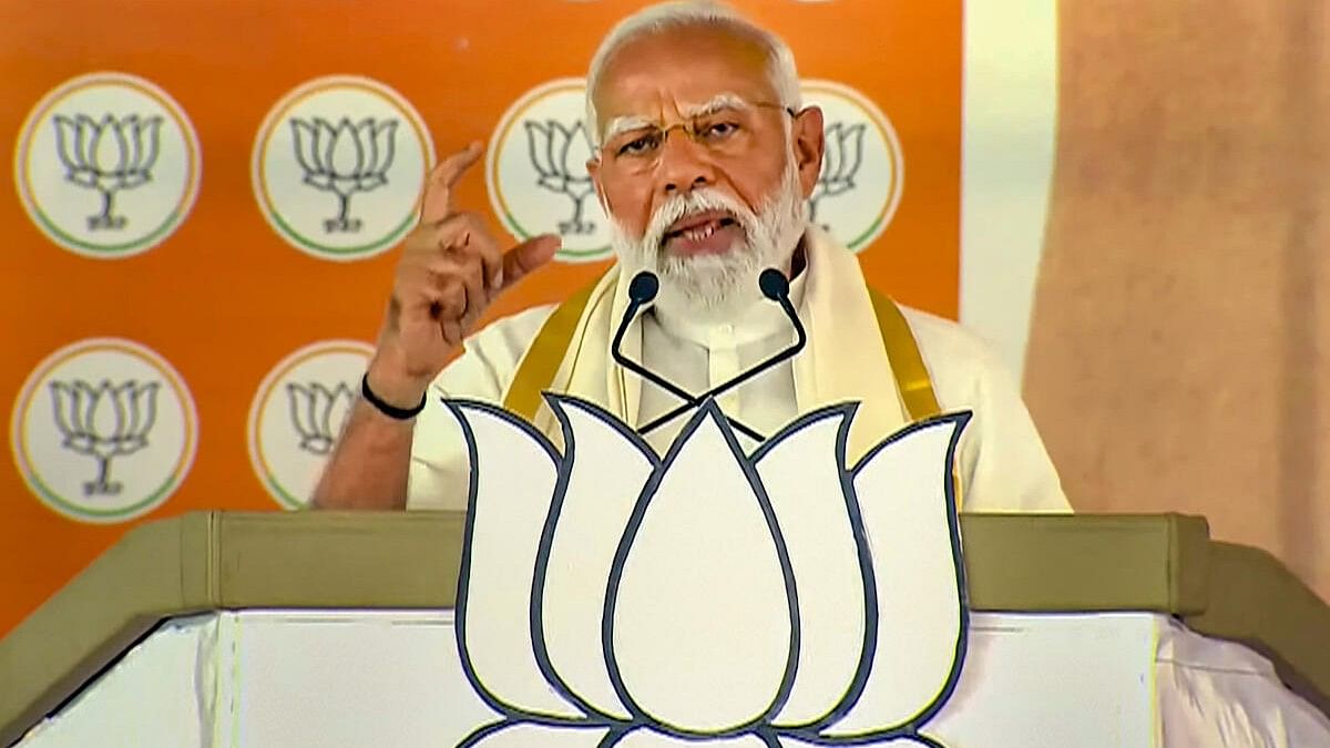 <div class="paragraphs"><p>Narendra Modi addresses a public meeting, ahead of Lok Sabha elections, in Alathur, Kerala</p></div>