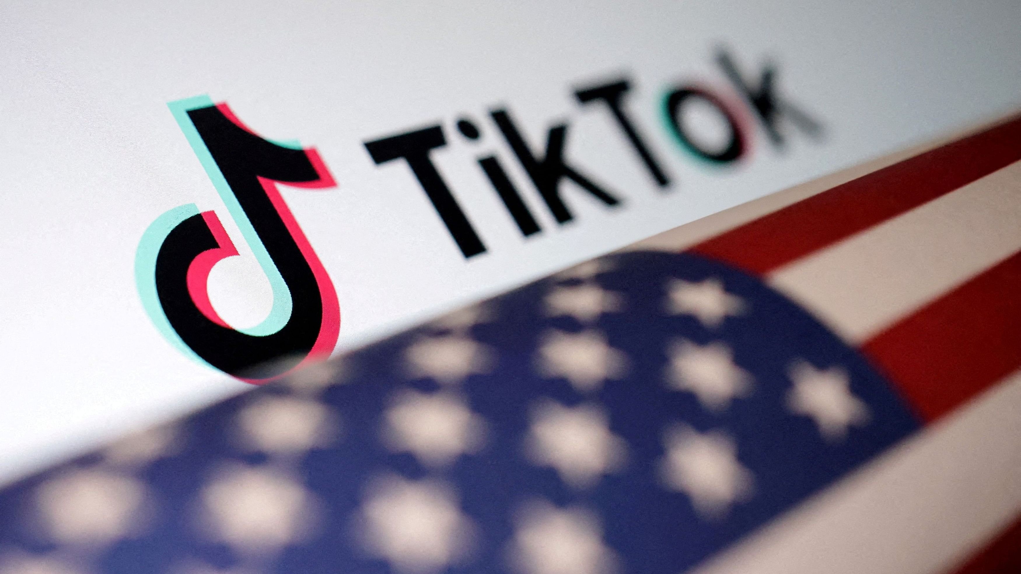 <div class="paragraphs"><p>US flag is placed on a TikTok log.</p></div>