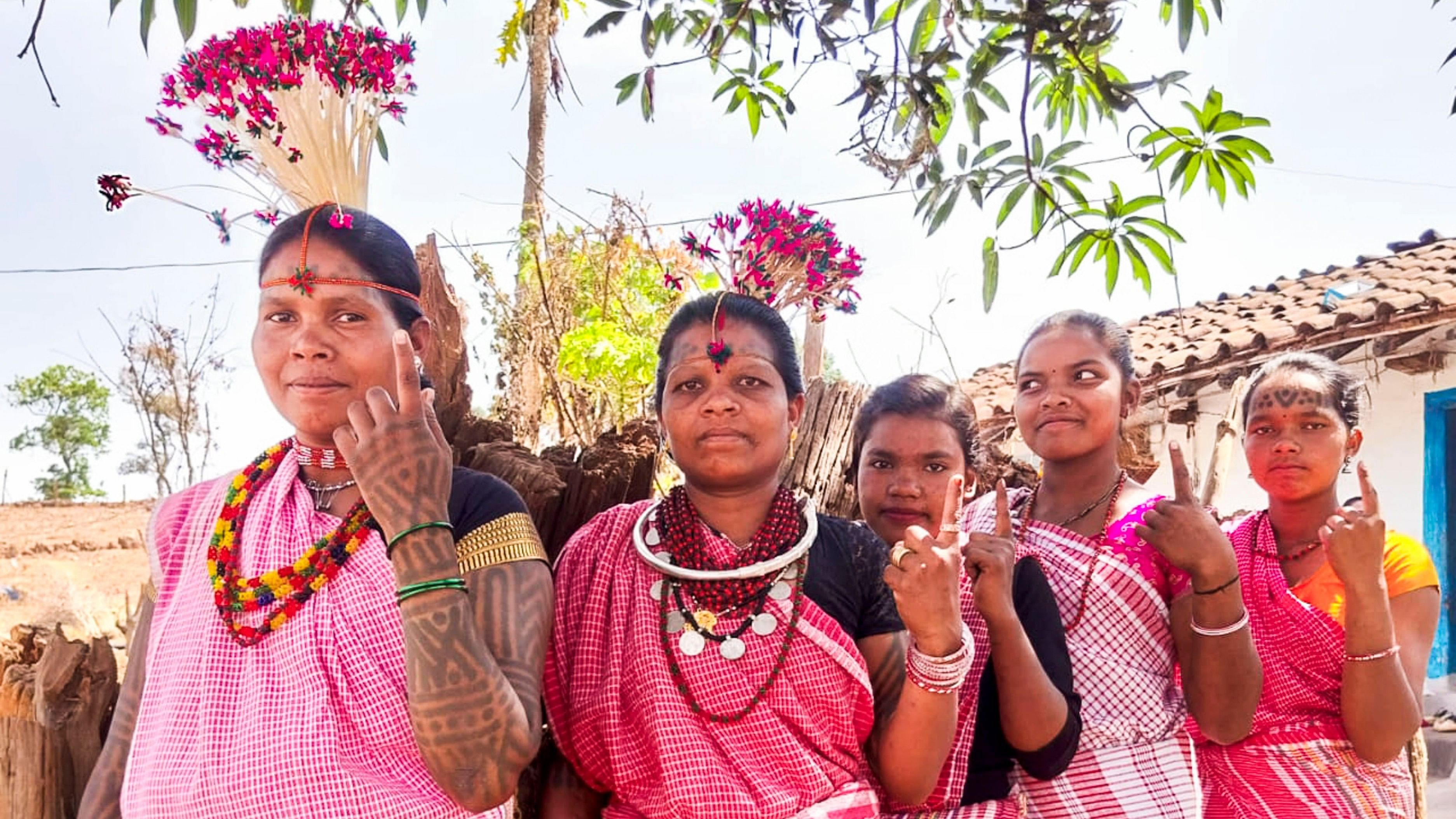 <div class="paragraphs"><p>Baiga tribal women show their fingers marked with indelible ink after casting their votes for the first phase of Lok Sabha&nbsp;elections,&nbsp;in Dindori district, Madhya Pradesh, Friday, April 19, 2024.</p></div>