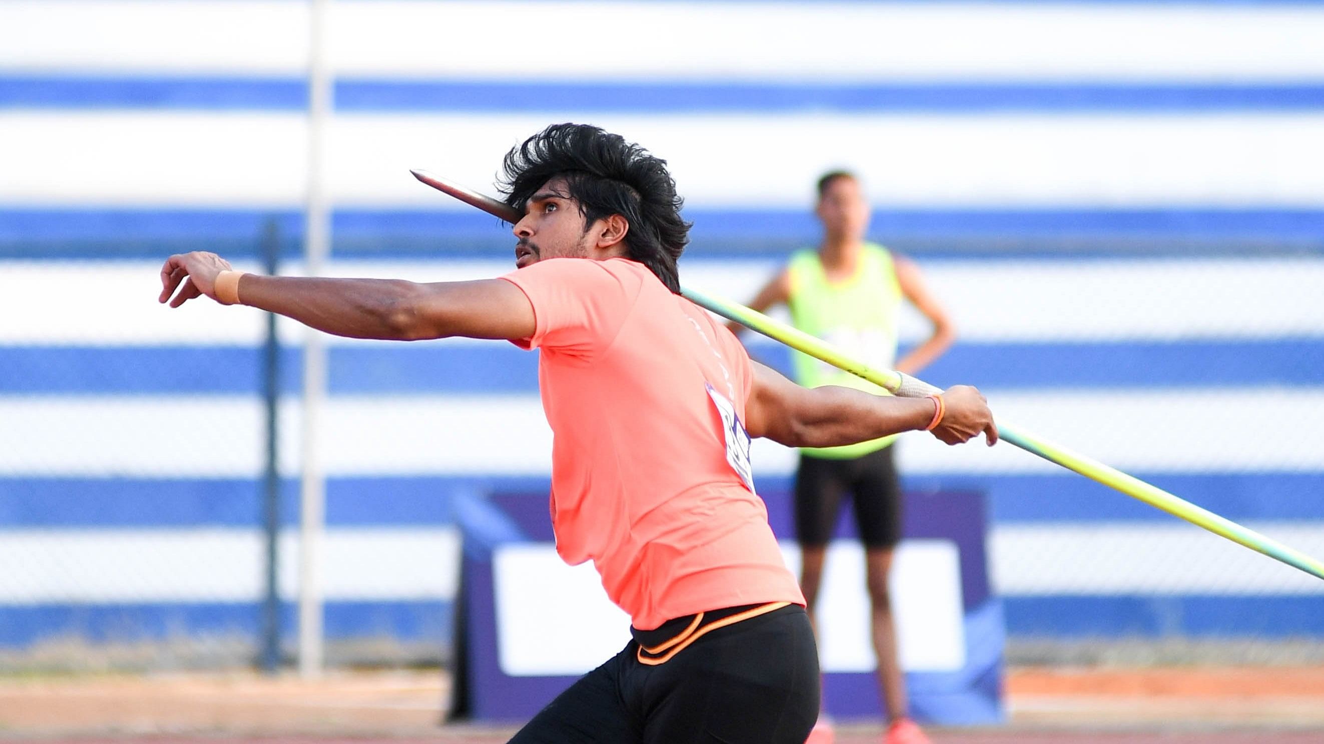 <div class="paragraphs"><p>Karnataka’s Manu DP competes in the men’s javelin throw event at the Indian Grand Prix-1 at the Sree Kanteerava stadium in Bengaluru on Tuesday. </p></div>