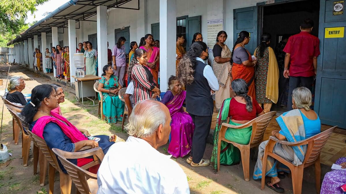 <div class="paragraphs"><p>Voters wait in a queue at a polling station to cast their votes at Kerala's Kozhikode Lok Sabha constituency.&nbsp;</p></div>