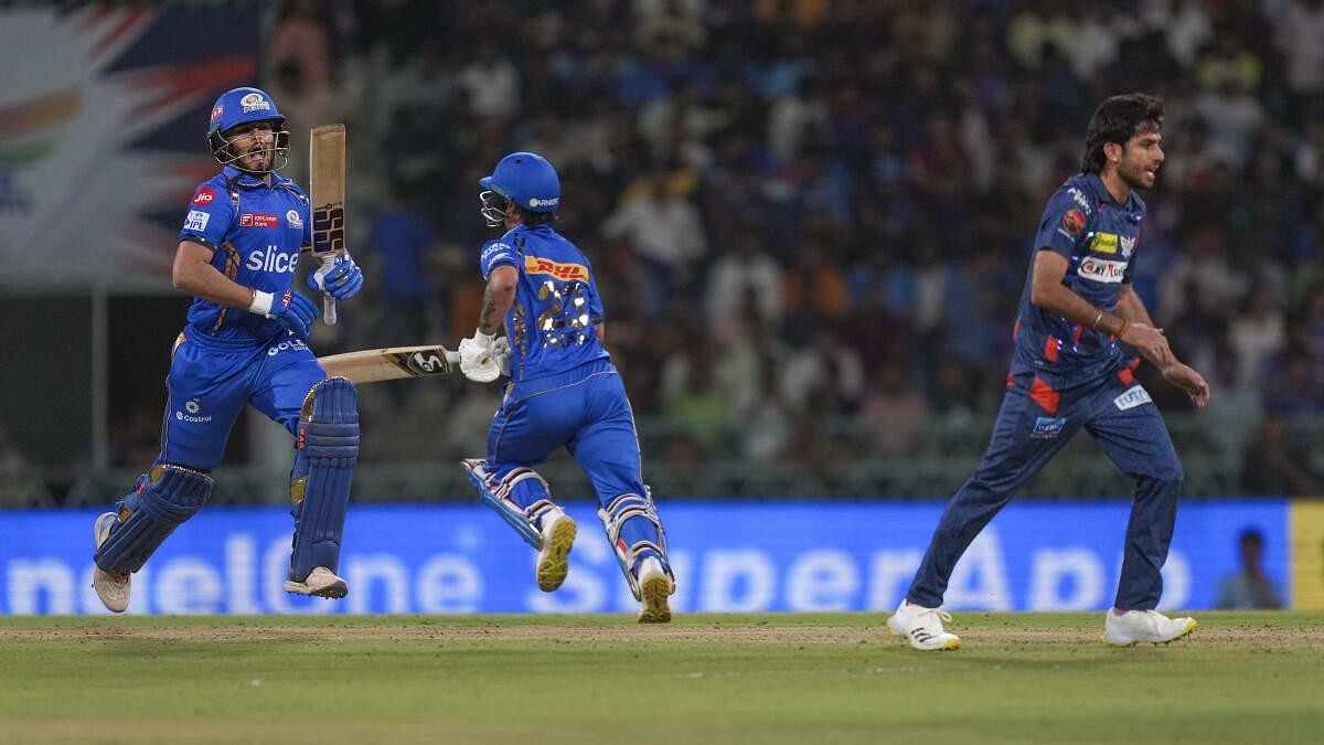 <div class="paragraphs"><p>Mumbai Indians batters Nehal Wadhera and Ishan Kishan running between the wickets during their match against LSG.</p></div>