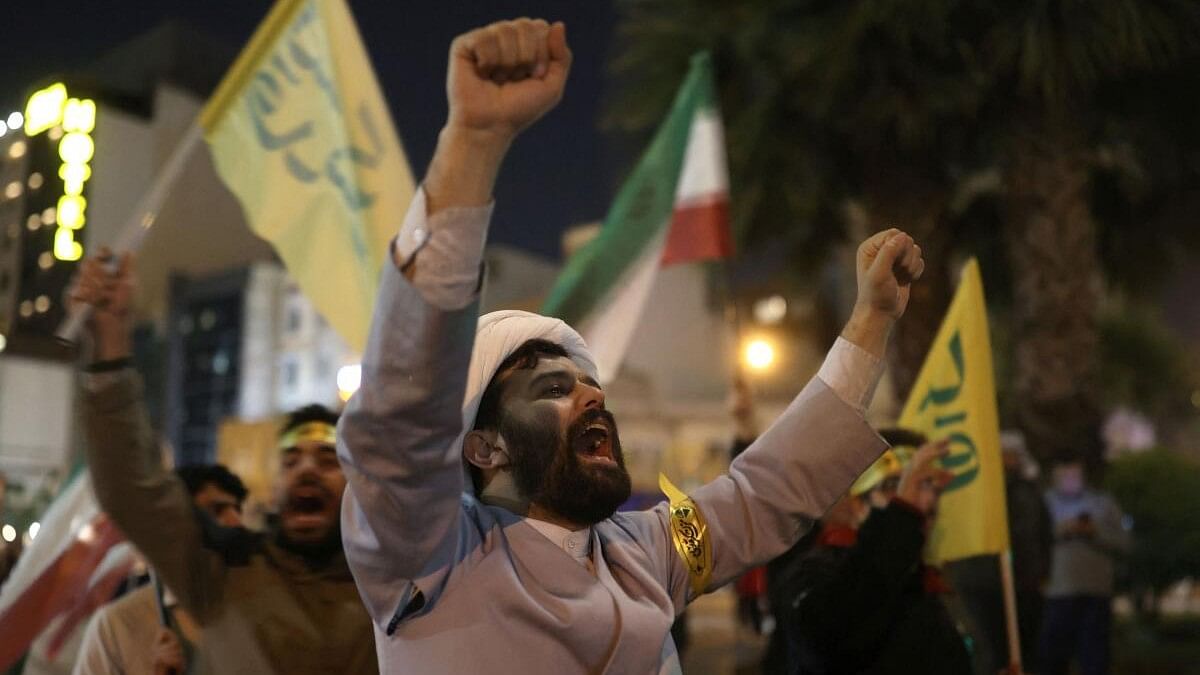 <div class="paragraphs"><p>Iranians celebrate on a street, after the IRGC attack on Israel, in Tehran, Iran, April 14, 2024.</p></div>