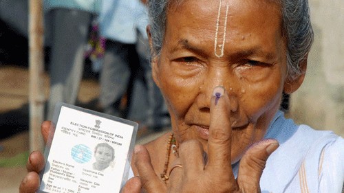 <div class="paragraphs"><p>File photo of an elderly woman showing her voter id at a poll booth in West Bengal.</p></div>