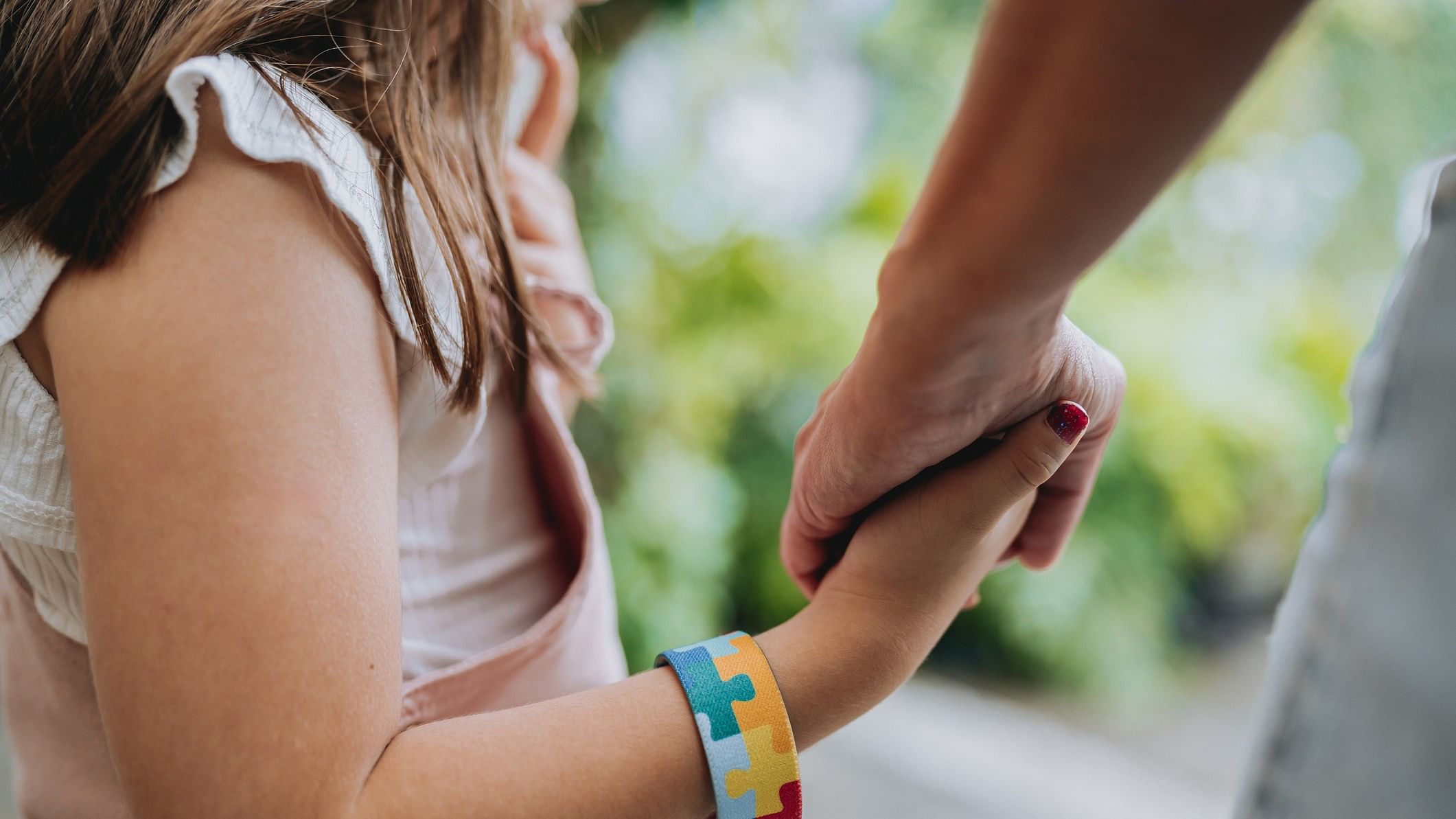 <div class="paragraphs"><p>Autistic child holding hands with her mother. (Representative image)</p></div>