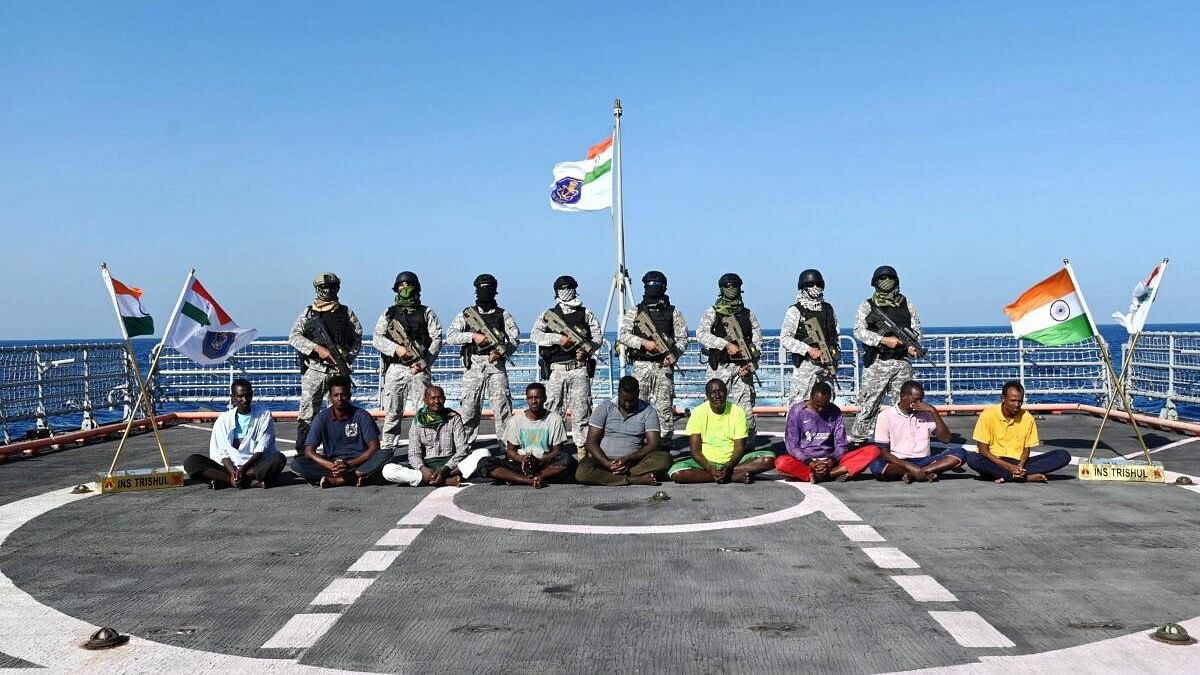 <div class="paragraphs"><p>Nine pirates who were handed over to the Mumbai Police by the Indian Navy in Mumbai. All nine pirates were apprehended following Indian warships INS Trishul and INS Sumedha's major operation in the high seas on March 29 that resulted in successful rescue of fishing vessel Al Kambar and its crew of 23 Pakistani nationals.</p></div>