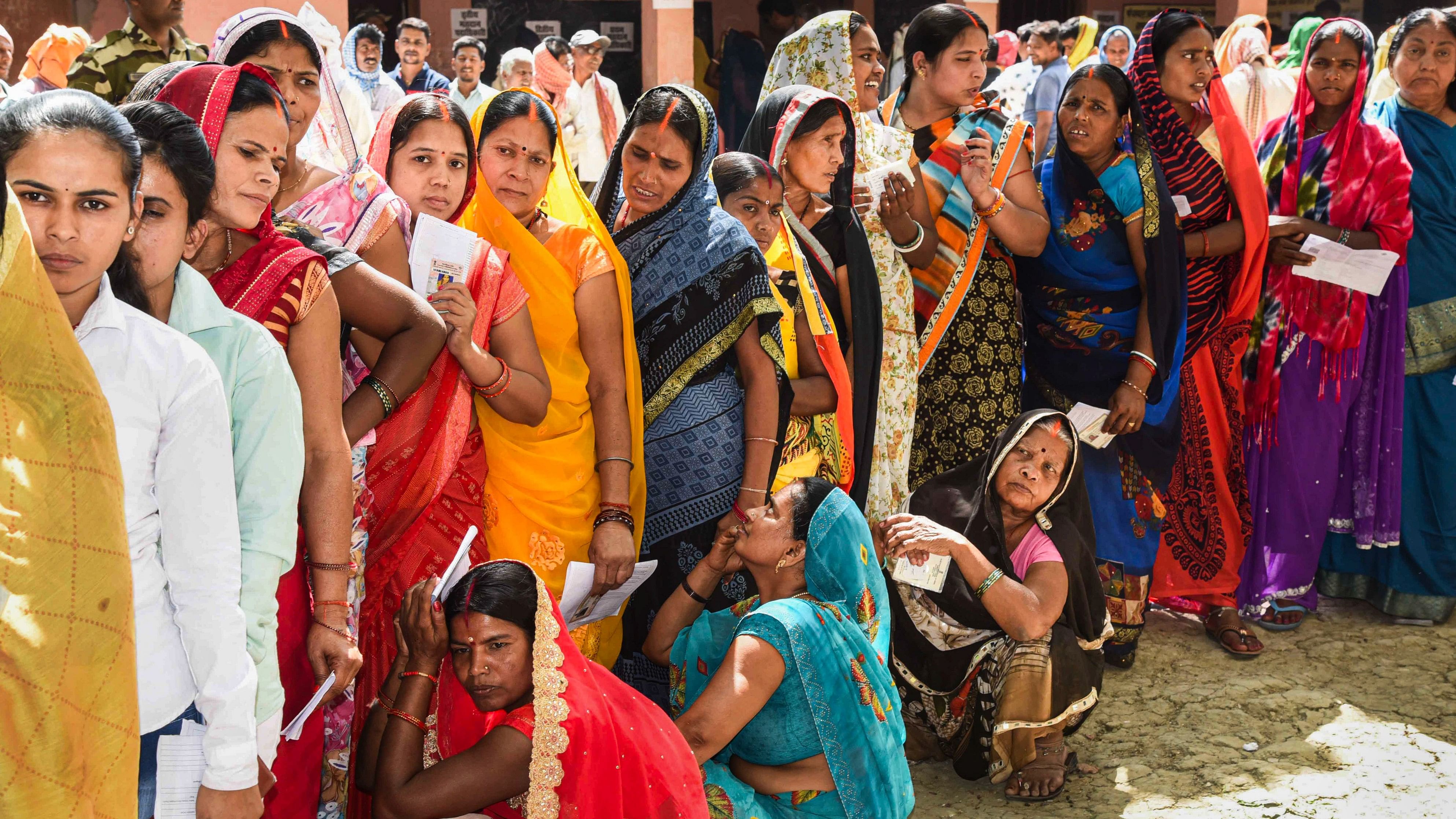 <div class="paragraphs"><p>Voters wait to cast their votes for Lok Sabha elections in Bihar.</p></div>