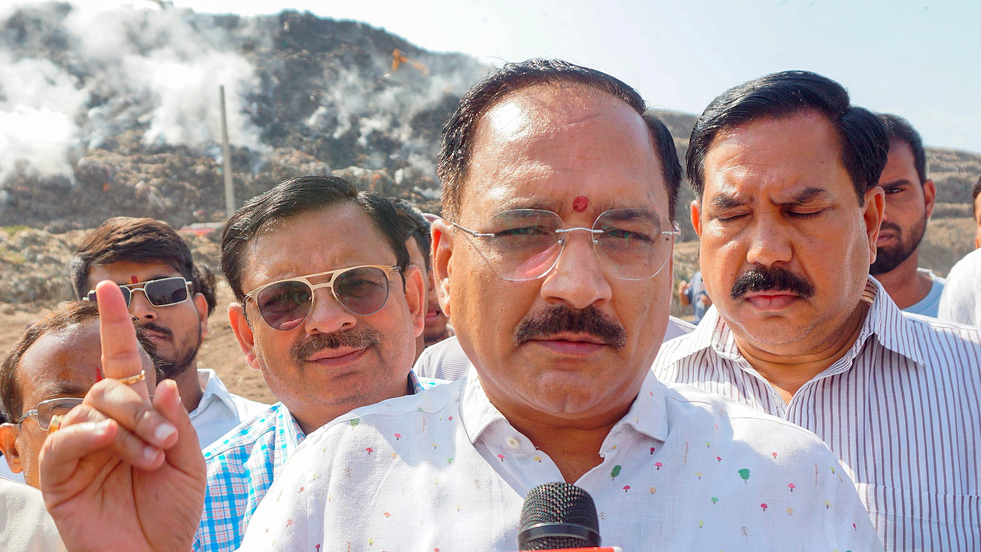 <div class="paragraphs"><p>Delhi BJP President Virendra Sachdeva addresses media during a visit at the Ghazipur landfill site where a fire broke out on Sunday, in New Delhi, Monday, April 22, 2024. </p></div>