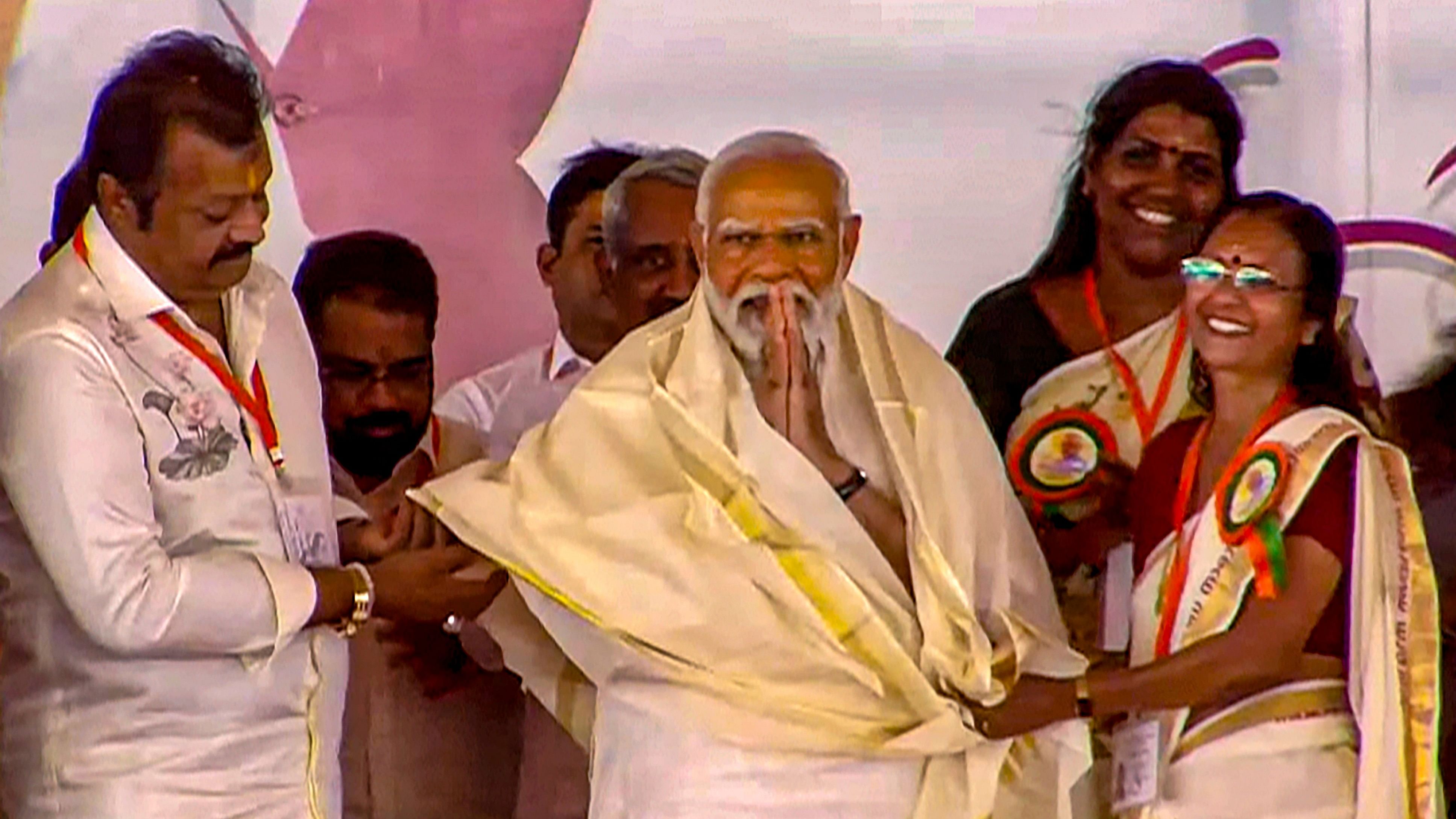 <div class="paragraphs"><p>Prime Minister Narendra Modi being felicitated at a public meeting, ahead of Lok Sabha elections, in Alathur, Kerala.</p></div>