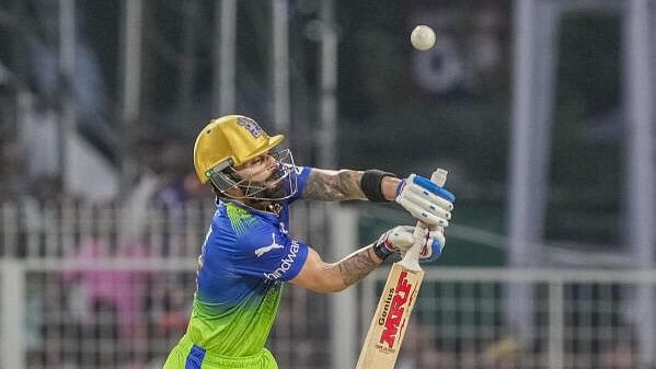 <div class="paragraphs"><p>Royal Challengers Bengaluru's Virat Kohli plays a shot during an Indian Premier League (IPL) T20 cricket match between Kolkata Knight Riders and Royal Challengers Bengaluru, at the Eden Gardens, in Kolkata, Sunday, April 21, 2024</p></div>