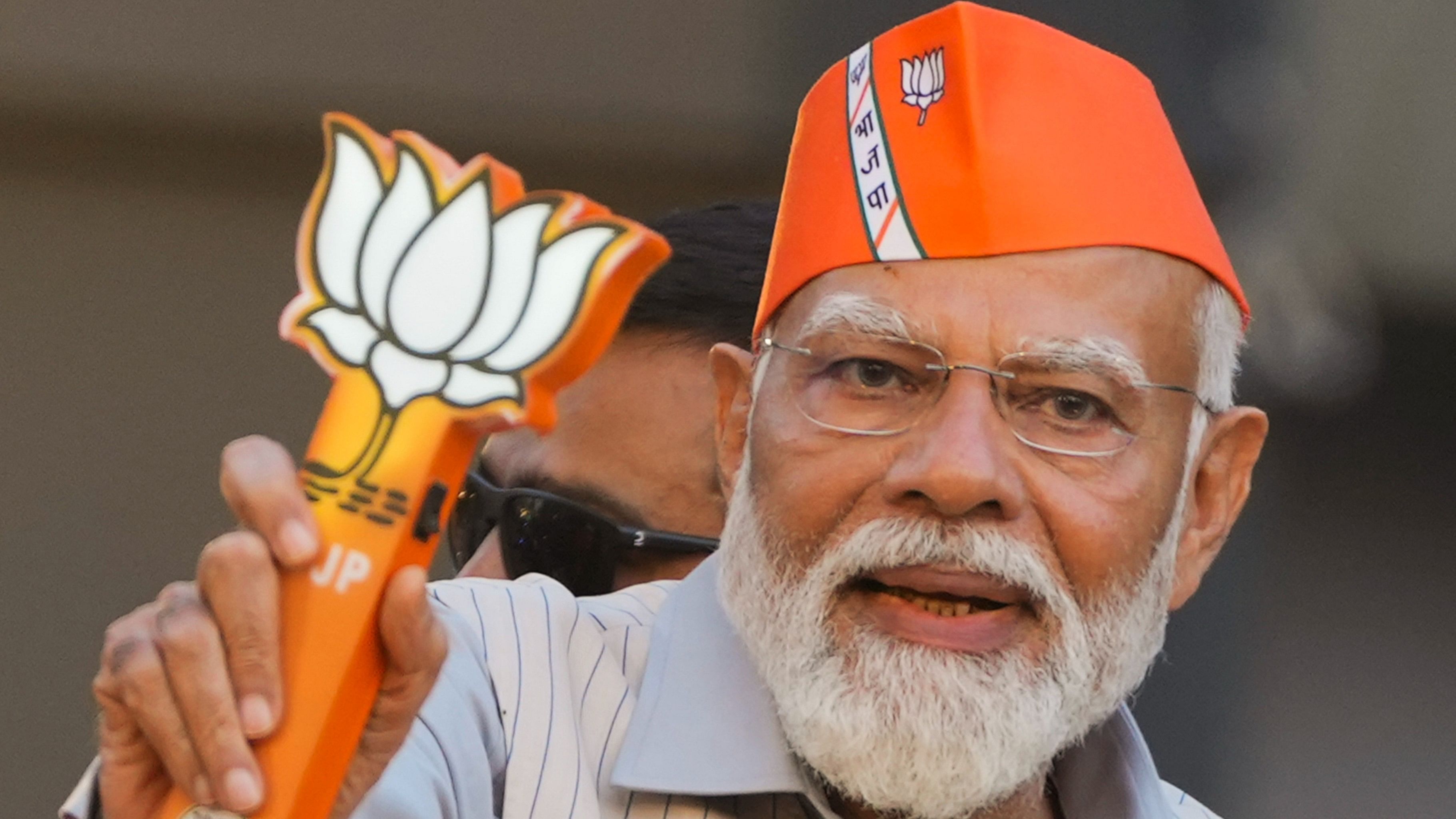 <div class="paragraphs"><p>Prime Minister Narendra Modi during a roadshow ahead of the upcoming Lok Sabha election, in Ghaziabad, Saturday, April 6, 2024.</p></div>