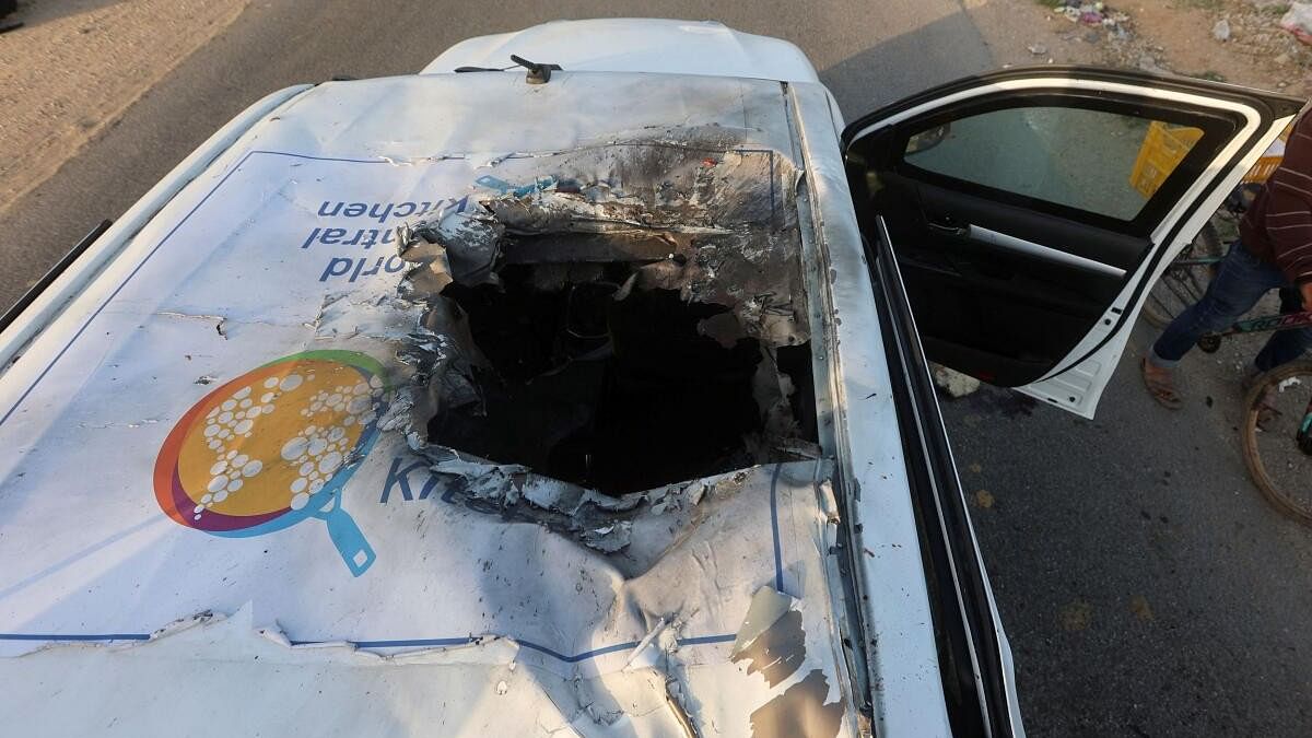 <div class="paragraphs"><p>A view of the destroyed roof of a vehicle where employees from the World Central Kitchen (WCK), including foreigners, were killed in an Israeli airstrike.</p></div>