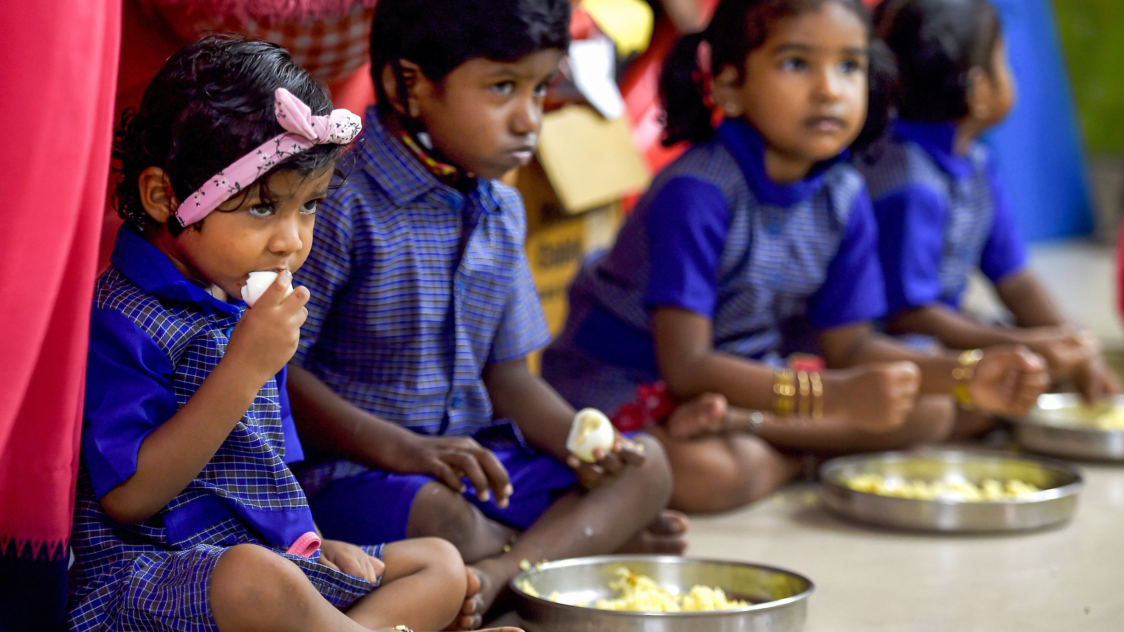 <div class="paragraphs"><p>File photo of&nbsp;Children eating their mid-day meal at an Integrated Child Development Services (ICDS) centre.</p></div>