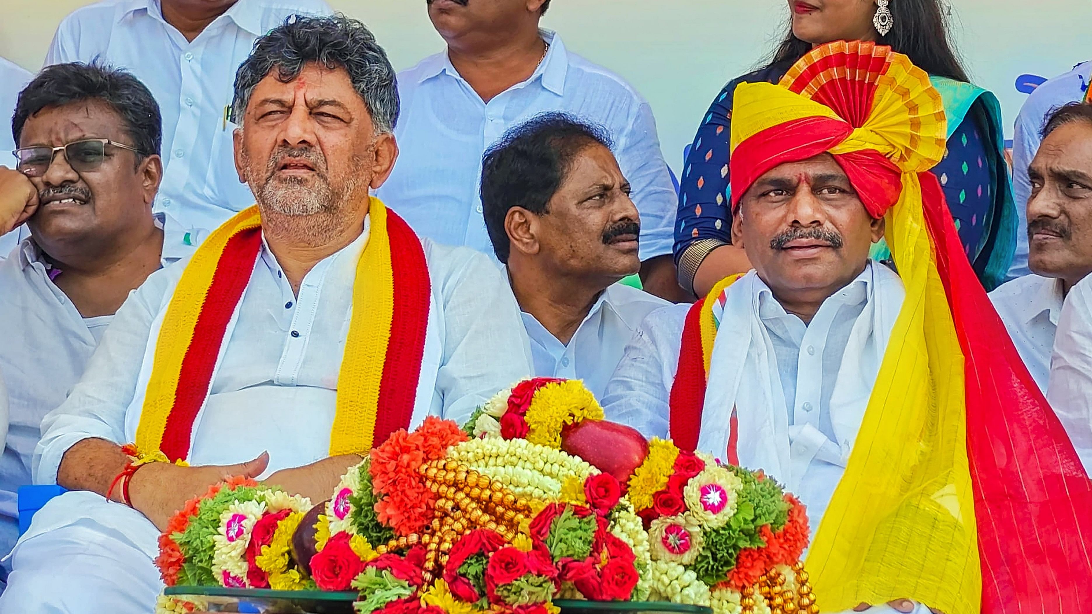 <div class="paragraphs"><p>Karnataka Deputy Chief Minister D K Shivakumar with Congress candidate from Bangalore Rural constituency D K Suresh during an election rally ahead of upcoming Lok Sabha elections.</p></div>
