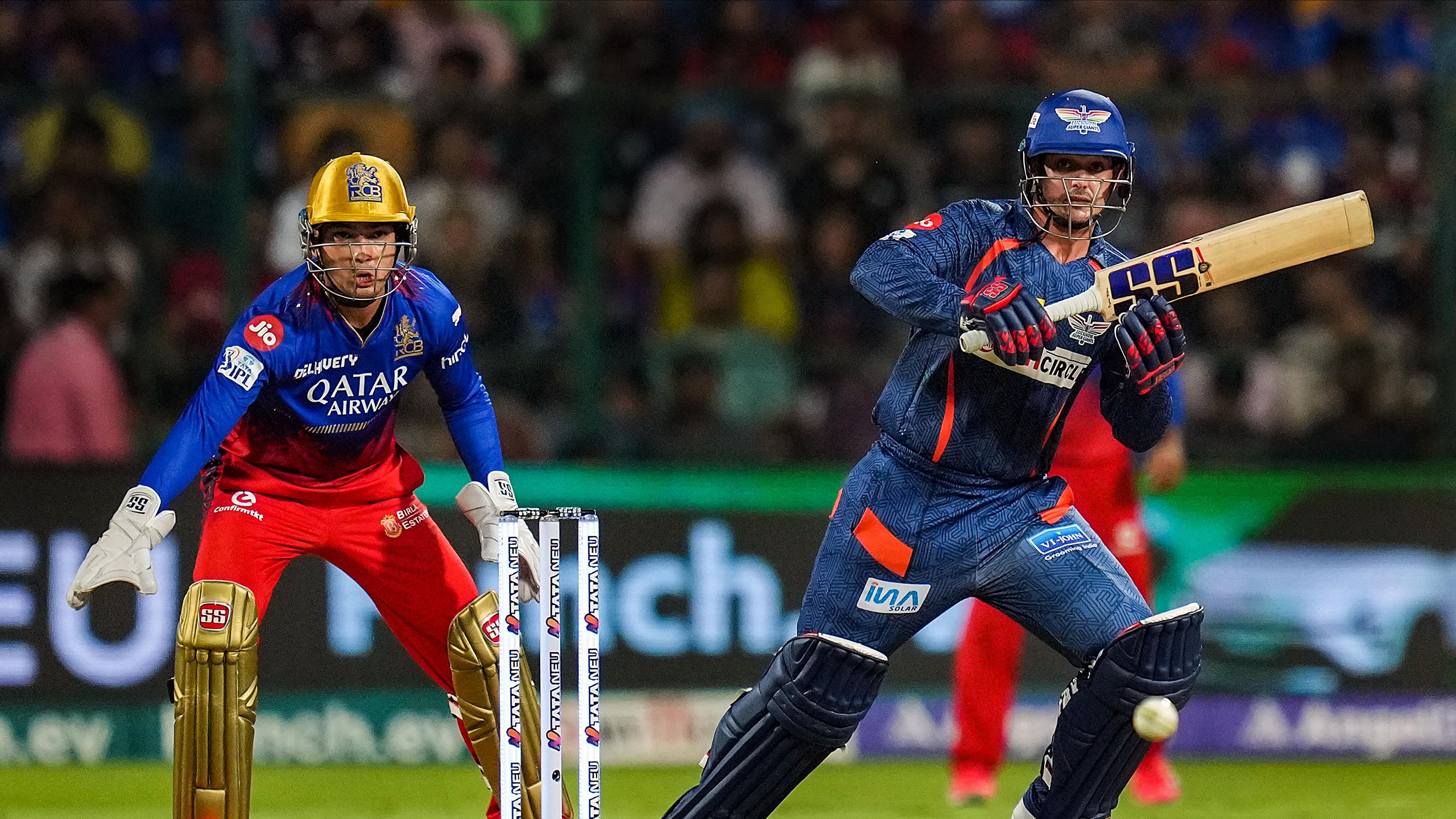 <div class="paragraphs"><p>Lucknow Super Giants' Quinton de Kock plays a shot during the Indian Premier League (IPL) 2024 T20 cricket match between Royal Challengers Bengaluru and Lucknow Super Giants, at M Chinnaswamy Stadium, in Bengaluru, on Tuesday</p></div>