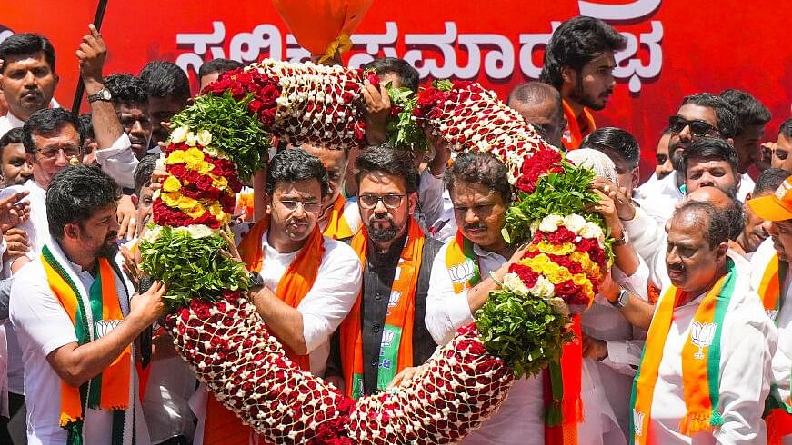 <div class="paragraphs"><p>Bengaluru South BJP candidate Tejasvi Surya with Union Minister Anurag Thakur, party leader R Ashoka and others during a rally before filing his nomination papers for Lok Sabha elections, in Bengaluru, Thursday, April 4, 2024.</p></div>
