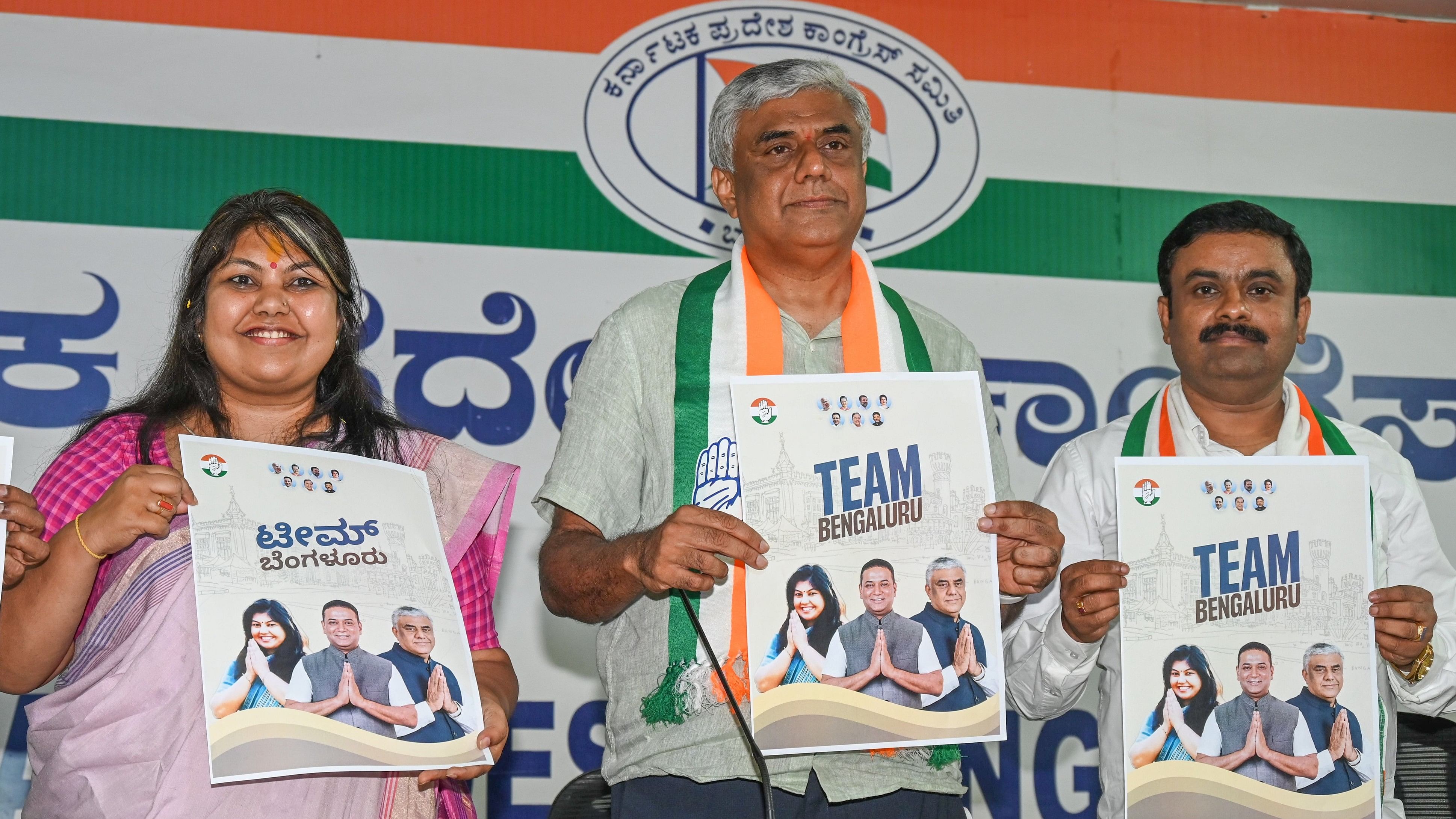<div class="paragraphs"><p>Congress candidates for Lok Sabha elections Sowmya Reddy and Prof M V Rajeev Gowda release "Team Bengaluru" poster in Bengaluru on Wednesday.&nbsp;</p></div>