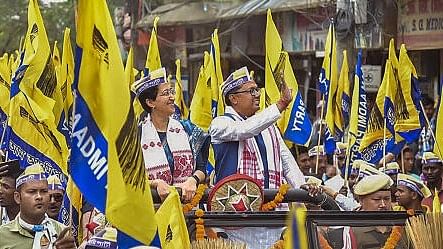 <div class="paragraphs"><p>AAP leader Atishi with party candidate Manoj Dhanowar during a roadshow ahead of Lok Sabha elections, at Duliajan in Dibrugarh district, Monday, April 8, 2024. </p></div>