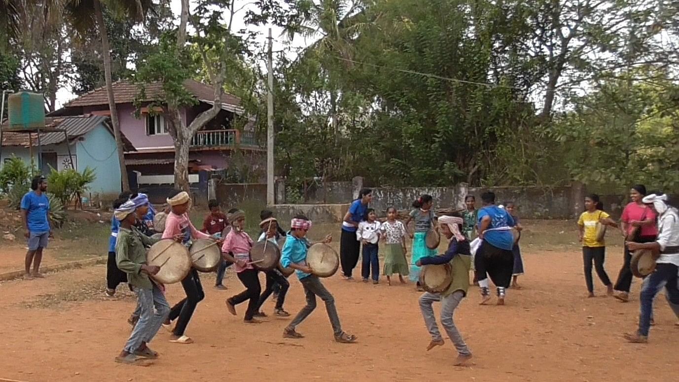 Children perform before the village, following a ‘tamate’ workshop; students watch a film at the Bheema Shaale.