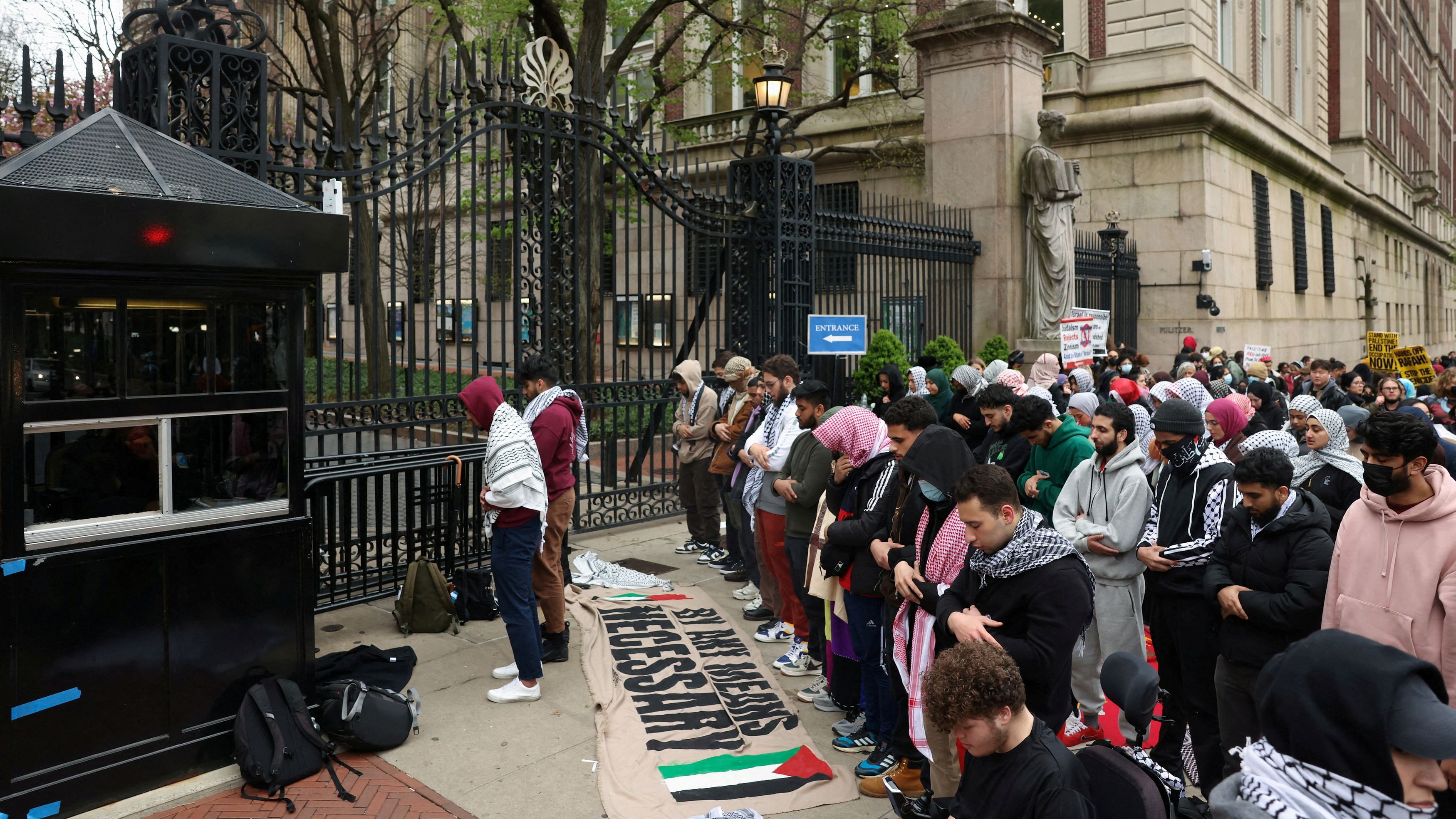 <div class="paragraphs"><p>Demonstrators pray outside an entrance to the Columbia University campus as they protest in solidarity with Pro-Palestinian organizers, amid the ongoing conflict between Israel and the Palestinian Islamist group Hamas, in New York City, U.S., April 18, 2024. </p></div>