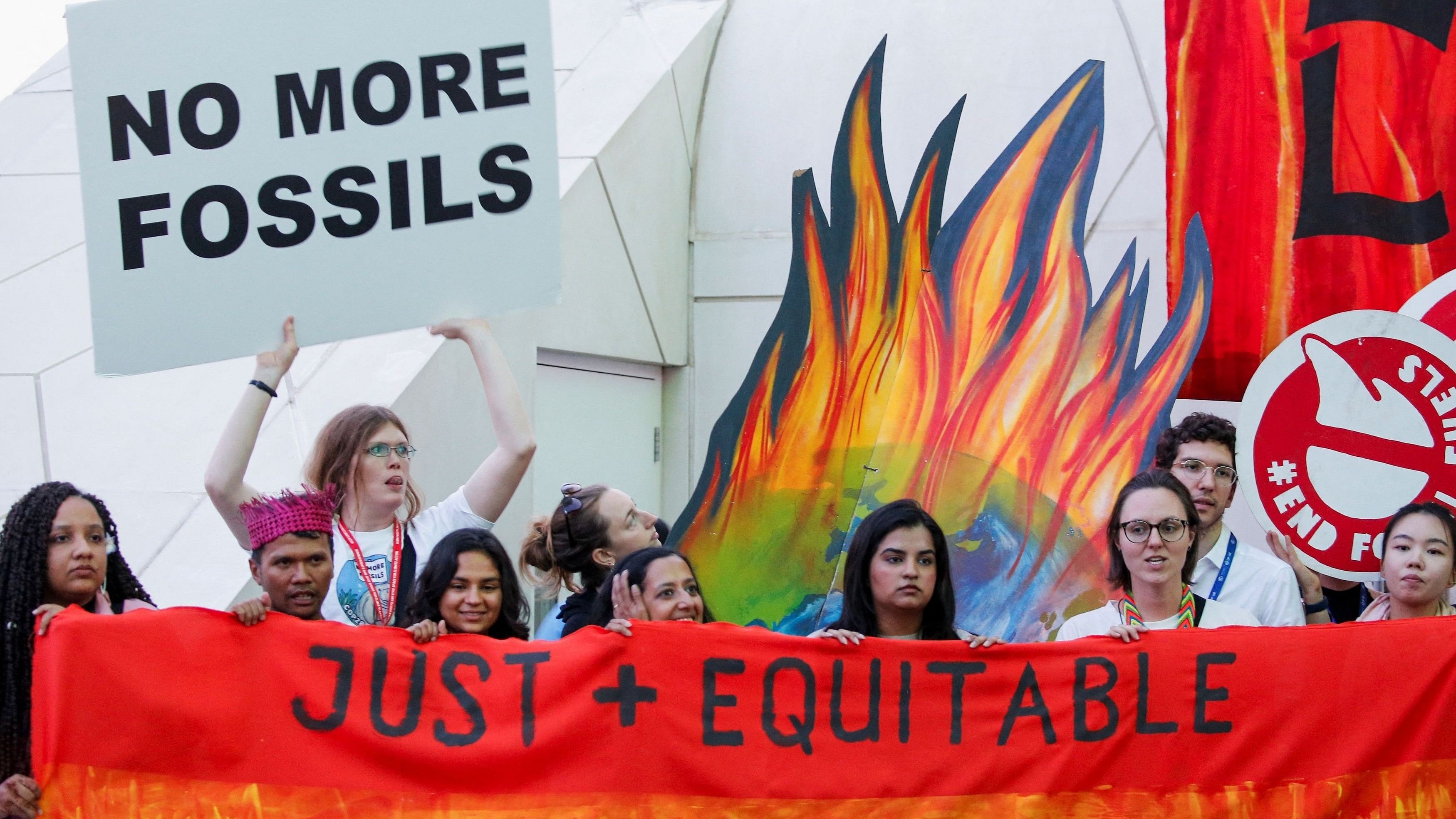 <div class="paragraphs"><p>Climate activists protest against use of fossil fuels.</p></div>