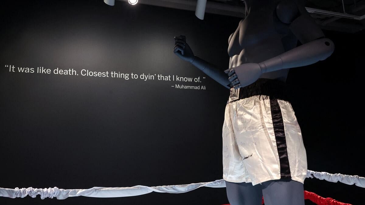 <div class="paragraphs"><p>Muhammad Ali's boxing trunks from the 1975 'Thrilla in Manila' boxing match with Joe Frazier stand on display at Sotheby's auction house in New York City.</p></div>