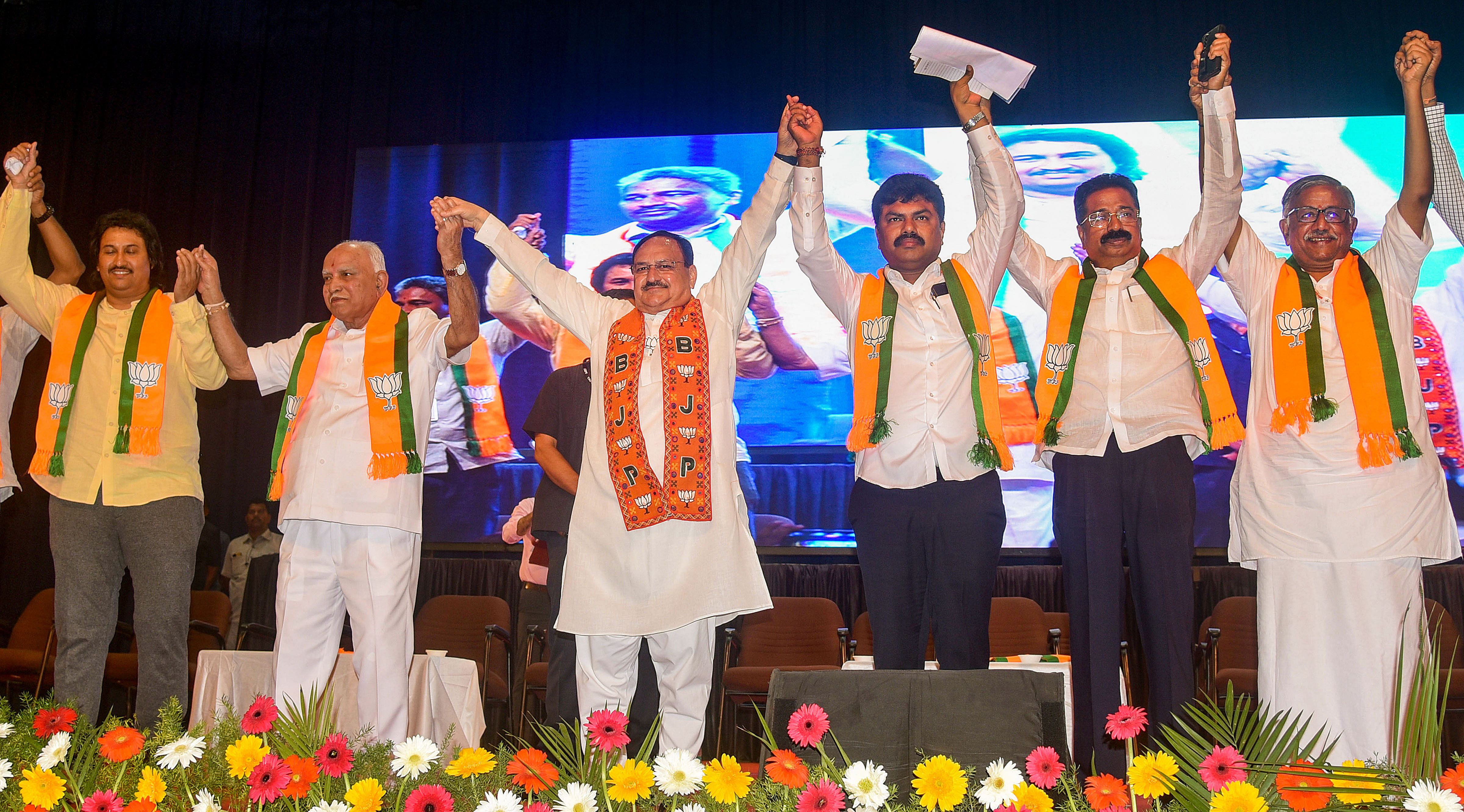 <div class="paragraphs"><p>BJP national president J P Nadda with party leaders B S Yediyurappa and others during a convention of the BJP’s professionals’ cell organised as part of the party’s campaign for Lok Sabha elections in Shivamogga on Tuesday. </p></div>