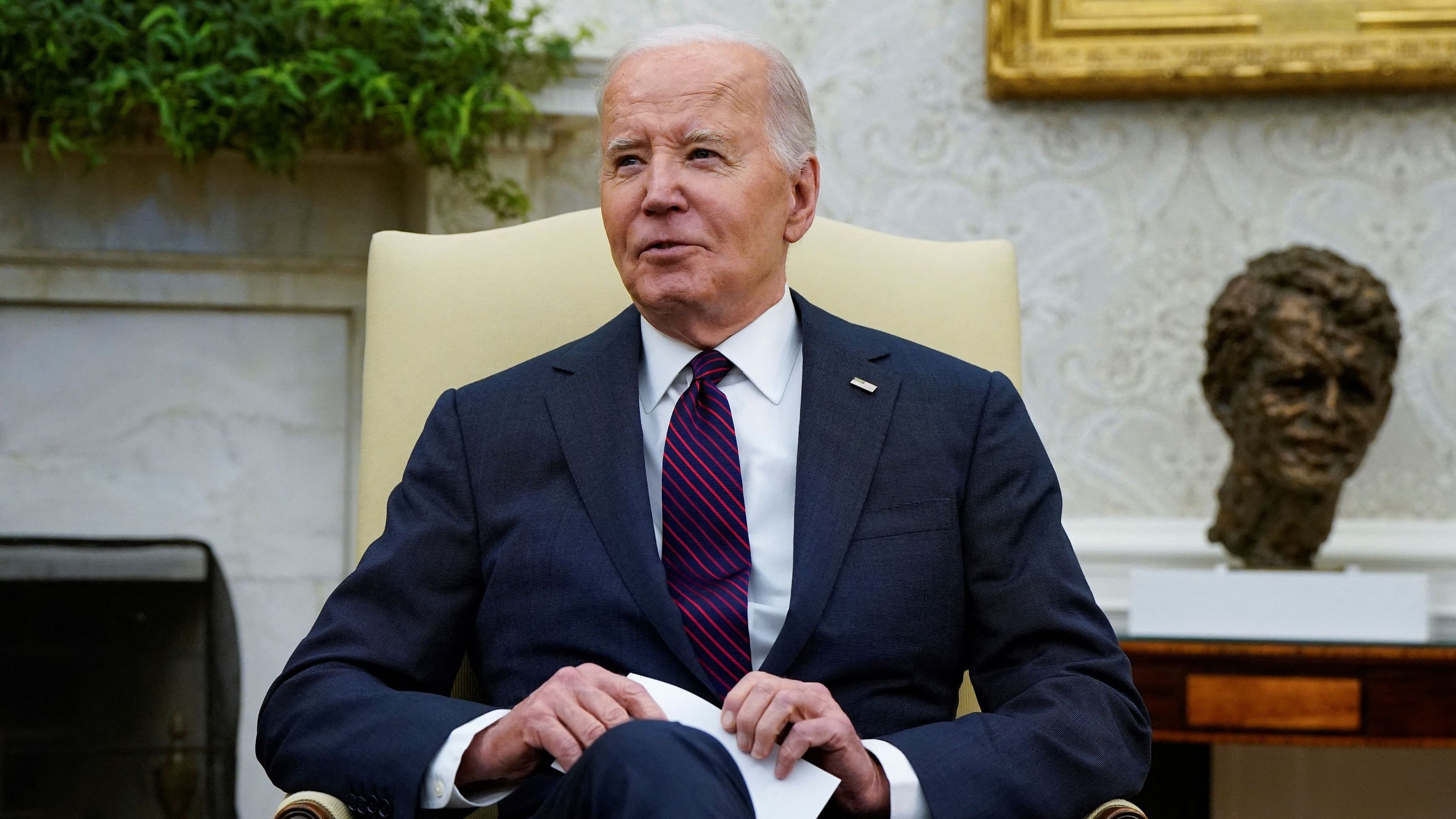 <div class="paragraphs"><p>US President Joe Biden looks on during a meeting on Tuesday.</p></div>