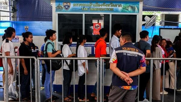 <div class="paragraphs"><p>People cross the Thailand-Myanmar Friendship Bridge as a stream of people, some of them fearing air strikes, queued at a border crossing to flee Myanmar early on Friday, a day after the strategically vital town of Myawaddy adjoining Thailand fell to anti-junta resistance that has been growing in strength, in Mae Sot, Tak province.</p></div>