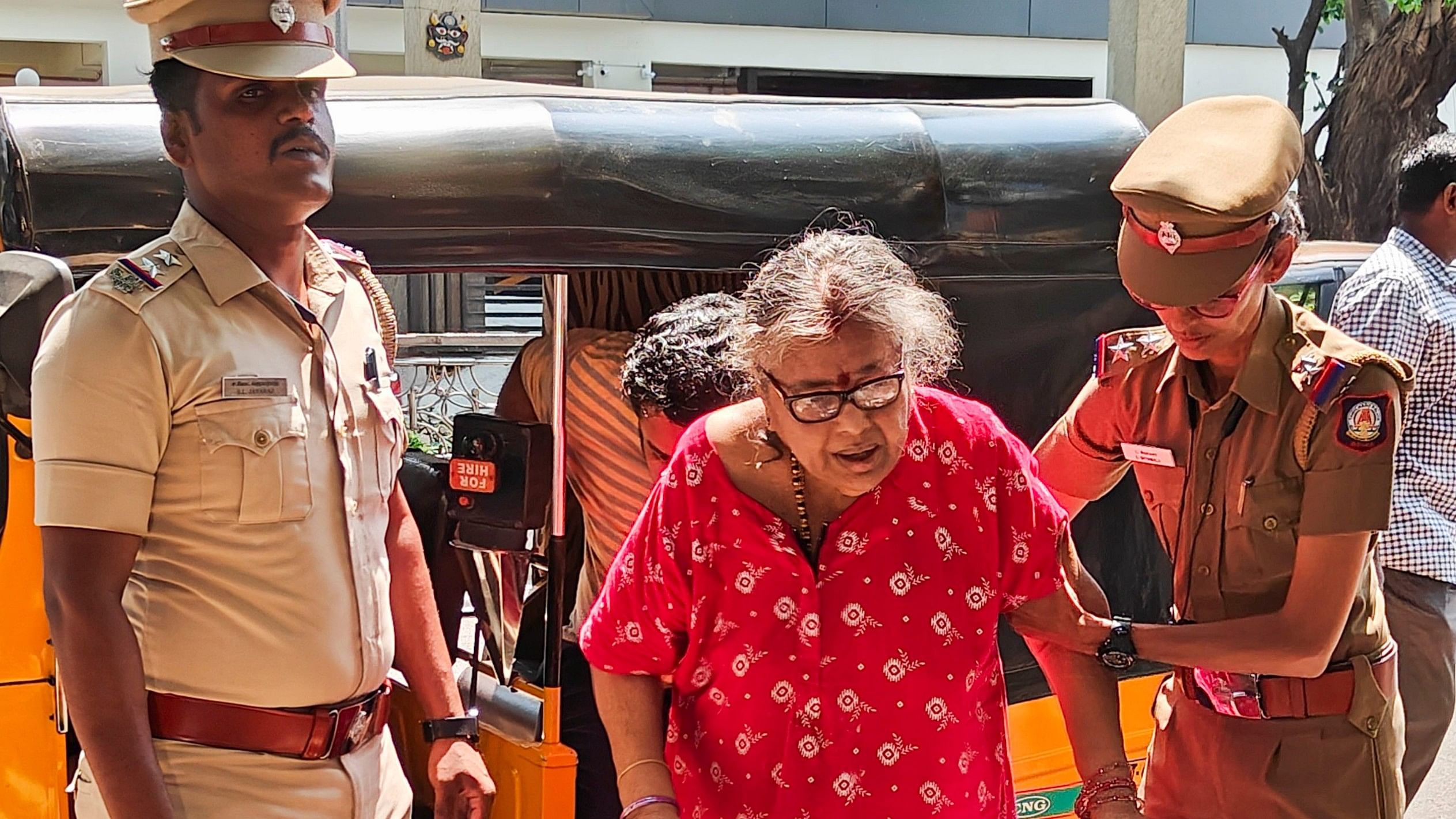 <div class="paragraphs"><p>An elderly voter being assisted as she arrives to cast her vote </p></div>