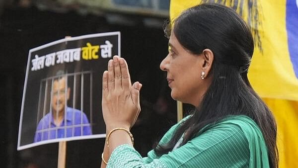 <div class="paragraphs"><p>Jailed Delhi Chief Minister Arvind Kejriwal's wife Sunita Kejriwal greets supporters during an election roadshow in New Delhi</p></div>