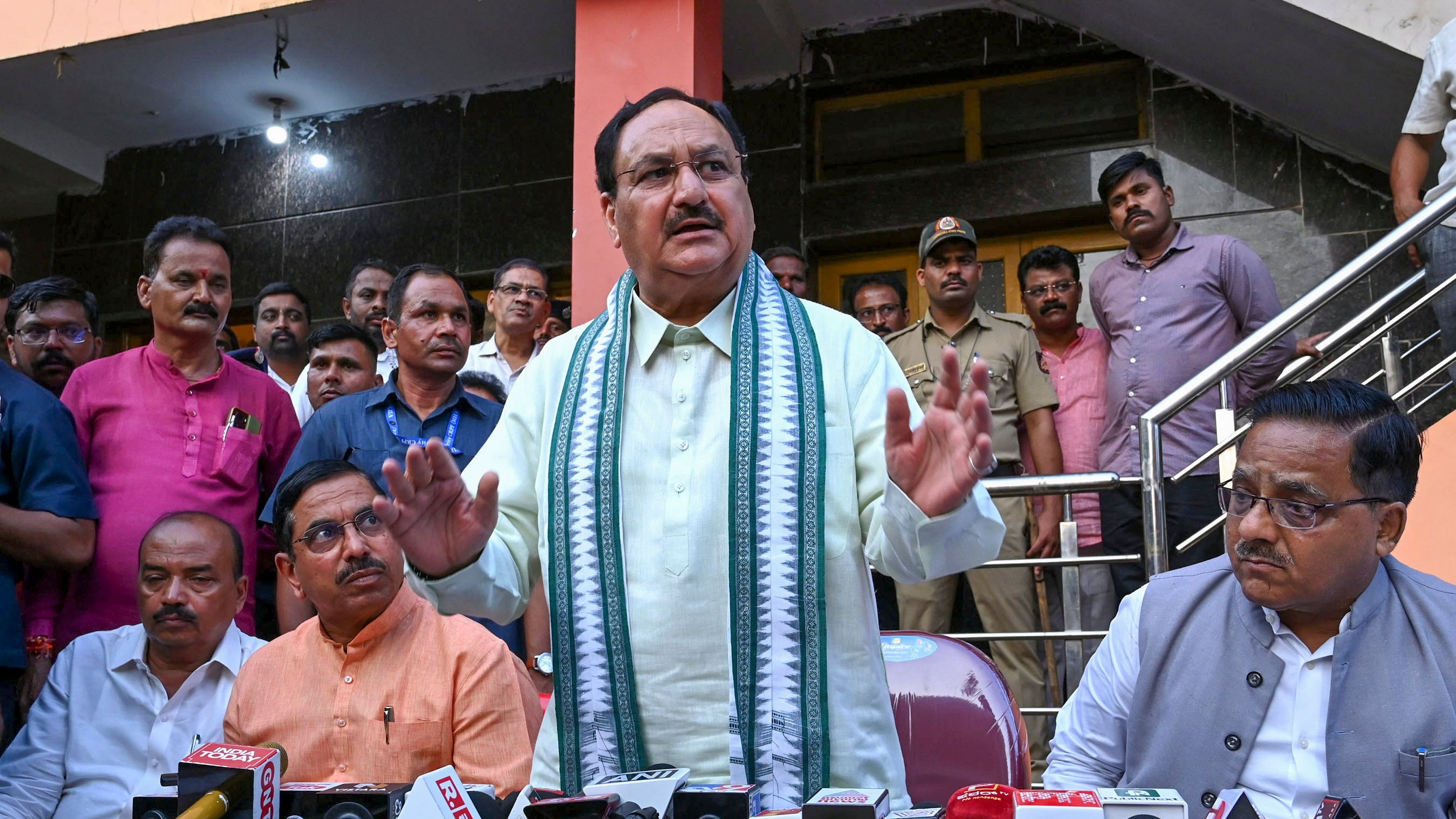 <div class="paragraphs"><p>Dharwad: BJP National President JP Nadda with Union Minister Pralhad Joshi and others addresses a press conference during his visit to Neha Hiremath's house, a 23-year-old college student who was recently stabbed to death by her former classmate in the premises of her college, at Hubballi, in Dharwad district, Sunday, April 21, 2024. </p></div>