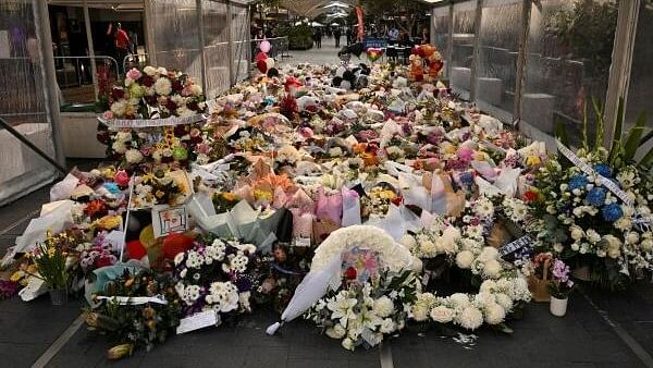 <div class="paragraphs"><p>Floral tributes are left for victims of the attack at Westfield Bondi Junction shopping centre on Saturday, in Sydney, Australia, April 17 2024.</p></div>