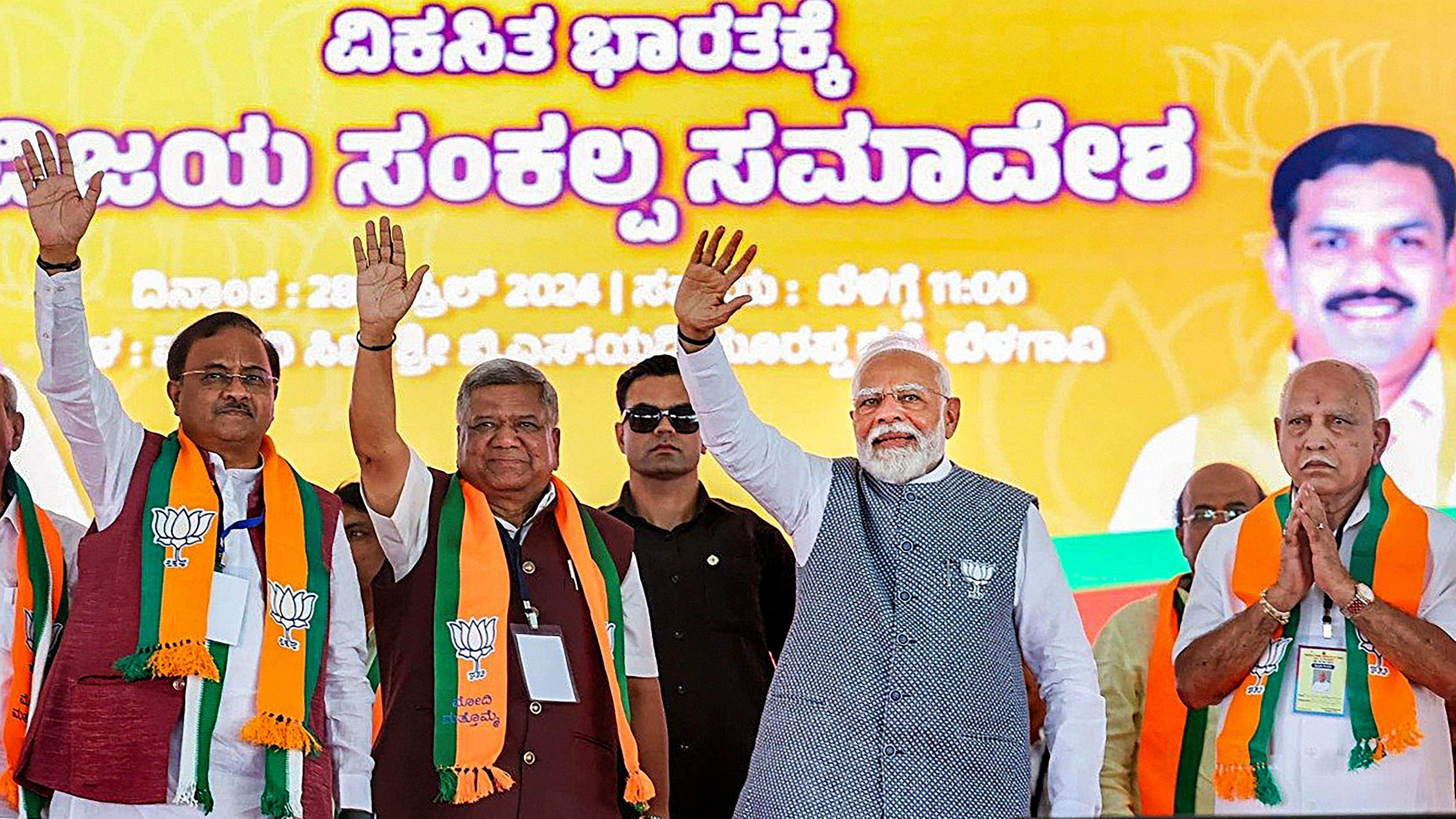 <div class="paragraphs"><p>File Photo: Prime Minister Narendra Modi with BJP leaders B.S. Yediyurappa and Jagadish Shettar during a public meeting for Lok Sabha elections, in Belagavi. </p></div>