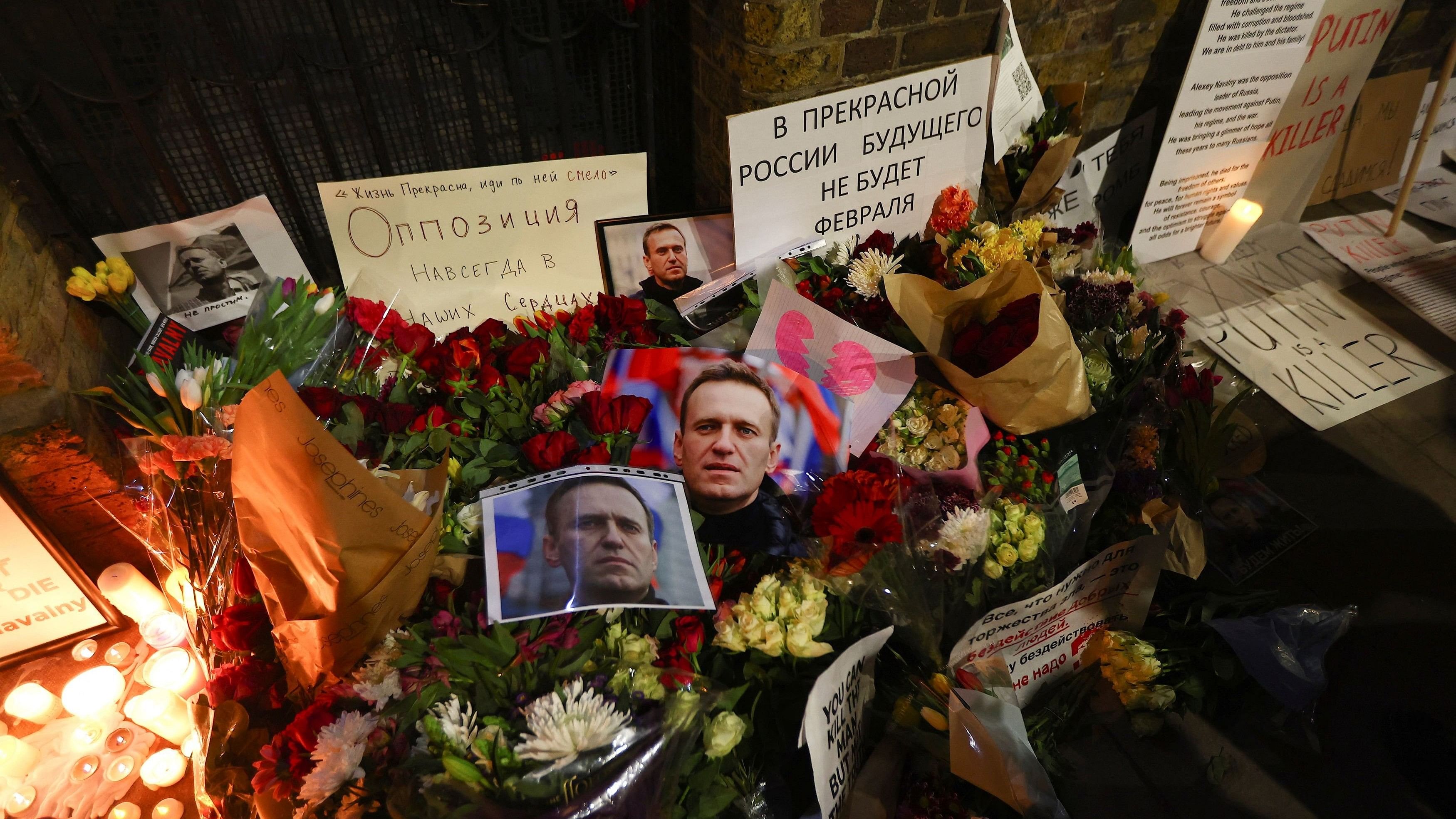 <div class="paragraphs"><p>A makeshift memorial stands outside the Russian Embassy in London as people protest over Russian opposition leader Alexei Navalny's death, in London, Britain, February 16, 2024. </p></div>