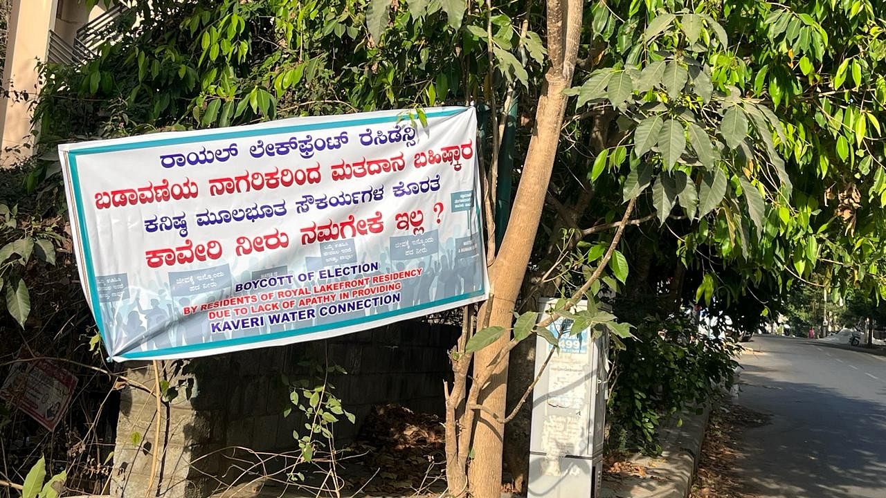 Members of Royal Lakefront Residency in JP Nagar 8th Phase put up banners, threatening to boycott the elections owing to the lack of water supply. SPECIAL ARRANGEMENT 