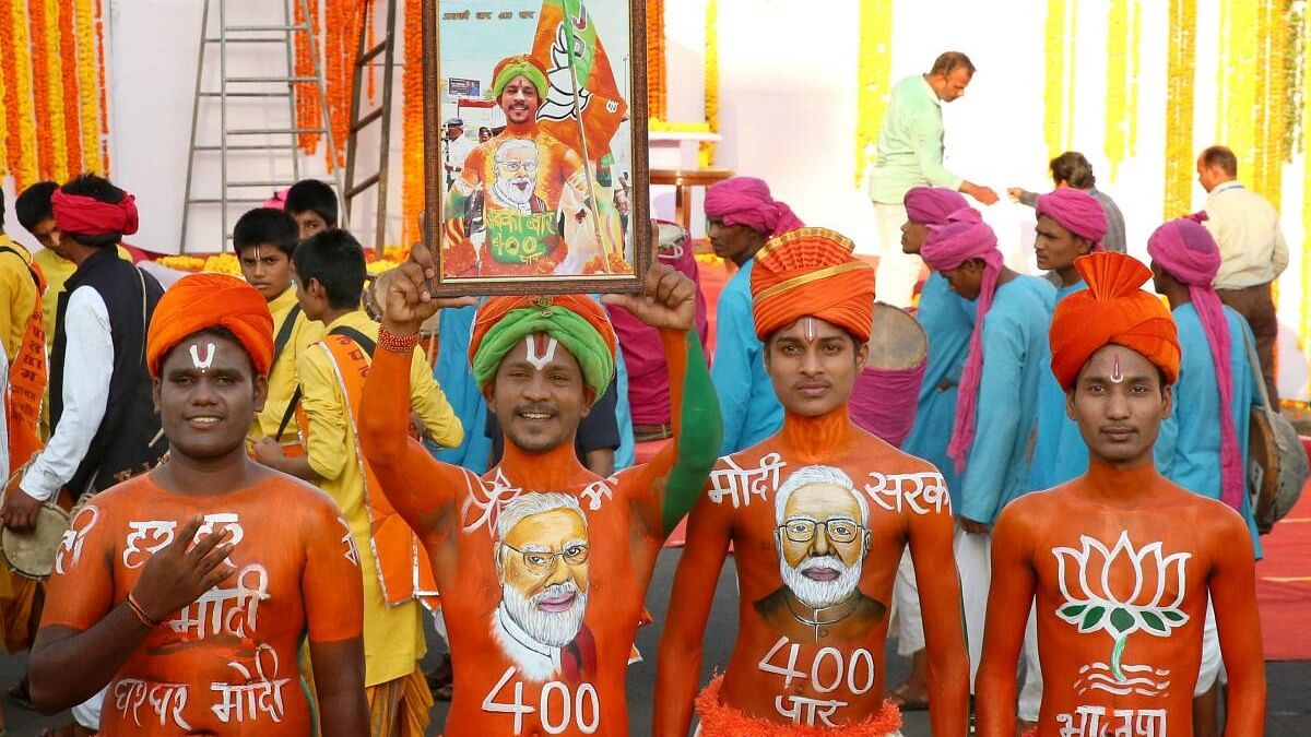 <div class="paragraphs"><p>Artists during Prime Minister Narendra Modi' roadshow ahead of the second phase of Lok Sabha elections, in Bhopal, Wednesday, April 24, 2024.</p></div>