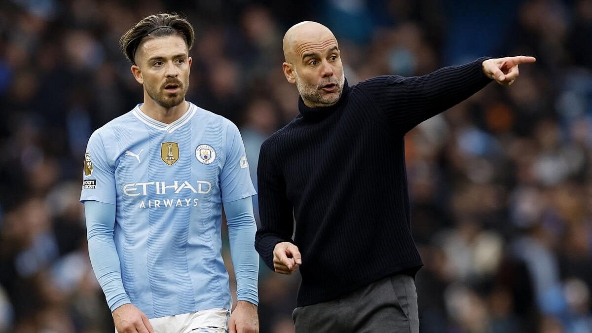 <div class="paragraphs"><p>(L-R) Jack Grealish and Pep Guardiola</p></div>